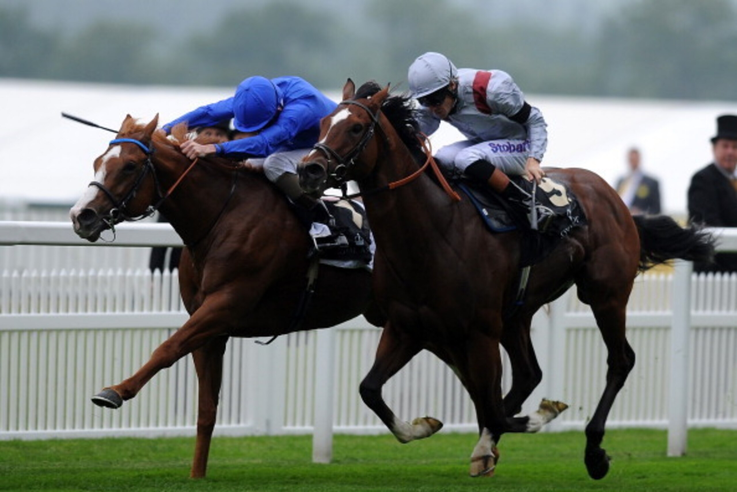 ASCOT, ENGLAND - JUNE 18:  (L-R)  Kevin J Manning riding Dawn Approach lands the St James's Palace Stakes ahead of second placed Richard Hughes riding Toronado during day one of Royal Ascot at Ascot Racecourse on June 18, 2013 in Ascot, England.  (Photo b
