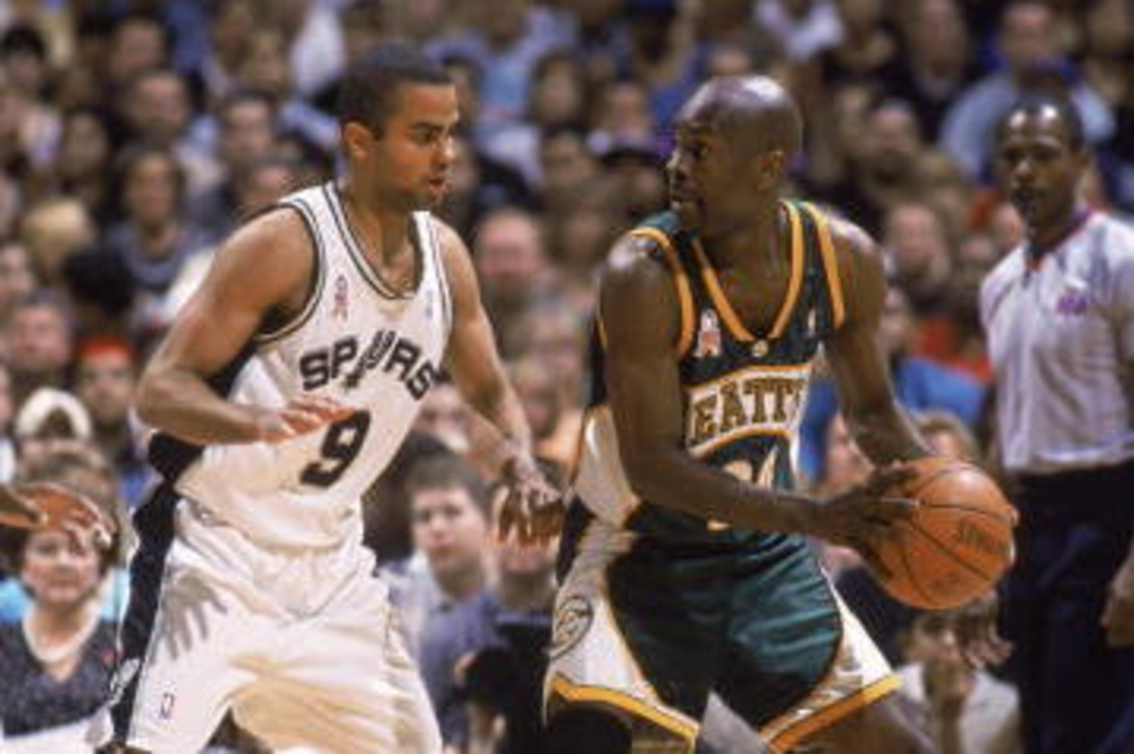SAN ANTONIO - MAY 3:  Gary Payton #20 of the Seattle SuperSonics posts up Tony Parker #9 of the San Antonio Spurs, during game 5 of the Western Conference quarterfinals during the 2002 NBA Playoffs at the Alamadome in May 3, 2002. The Spurs won, 101-78.  