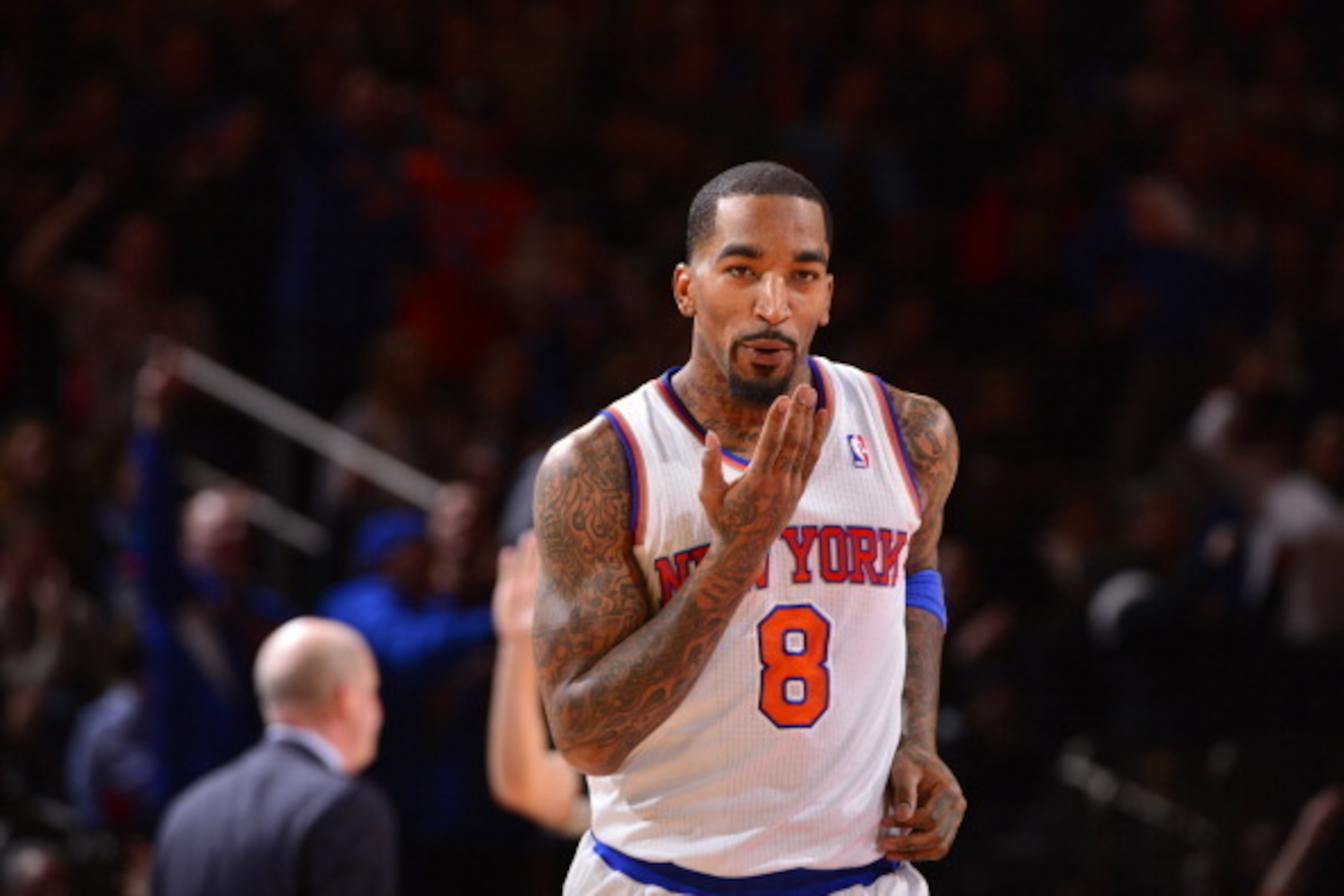 NEW YORK - JANUARY 24: J.R. Smith #8 of the New York Knicks celebrates during the game against the Charlotte Bobcats on January 24, 2014 at Madison Square Garden in New York City. NOTE TO USER: User expressly acknowledges and agrees that, by downloading a