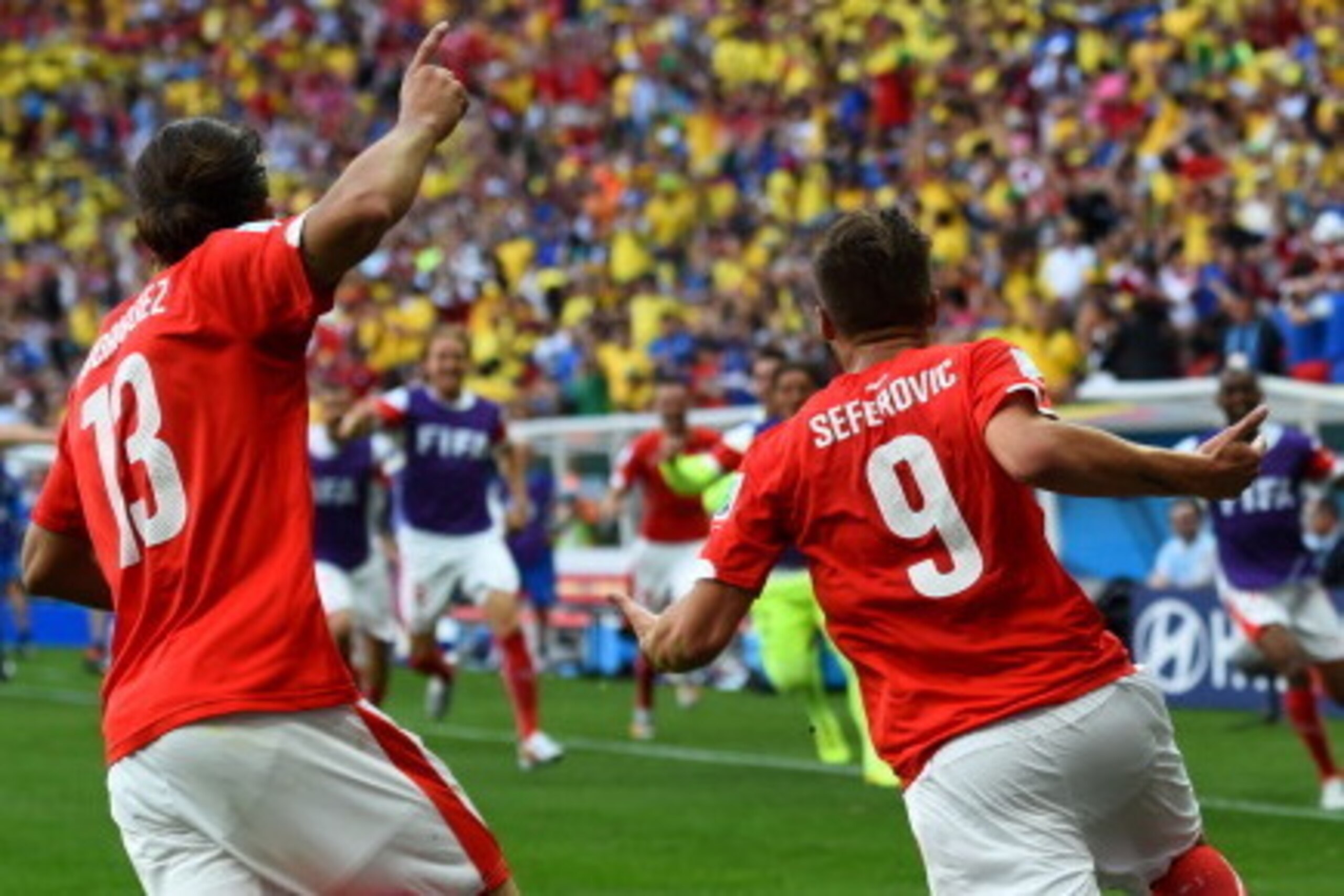 BRASILIA, BRAZIL - JUNE 15:  Haris Seferovic of Switzerland (R) and Ricardo Rodriguez celebrate after Switzerland's secund goal during the 2014 FIFA World Cup Brazil Group E match between Switzerland and Ecuador at Estadio Nacional on June 15, 2014 in Bra