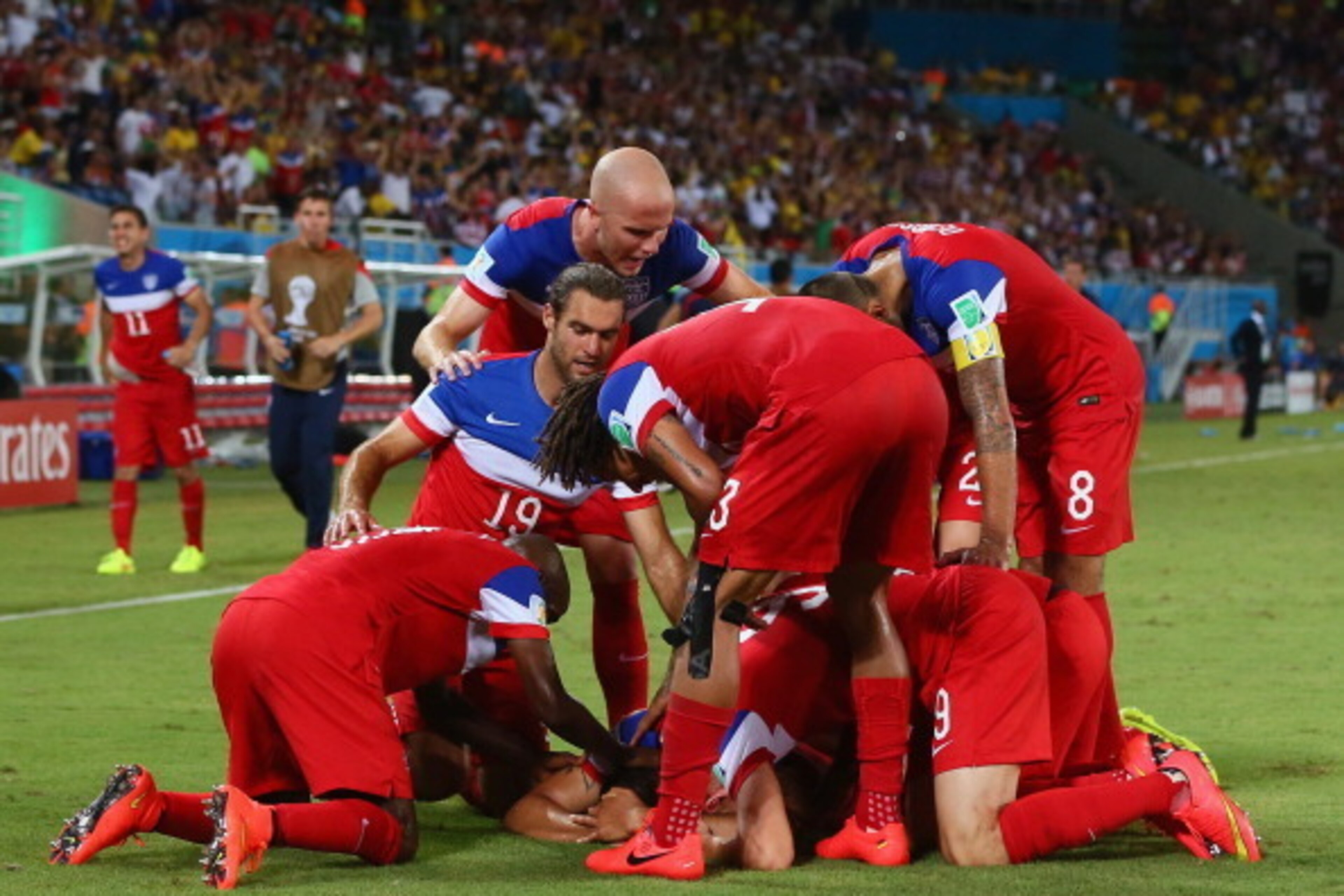 NATAL, BRAZIL - JUNE 16: John Brooks of the United States celebrates scoring his team's second goal with teammates during the 2014 FIFA World Cup Brazil Group G match between Ghana and the United States at Estadio das Dunas on June 16, 2014 in Natal, Braz