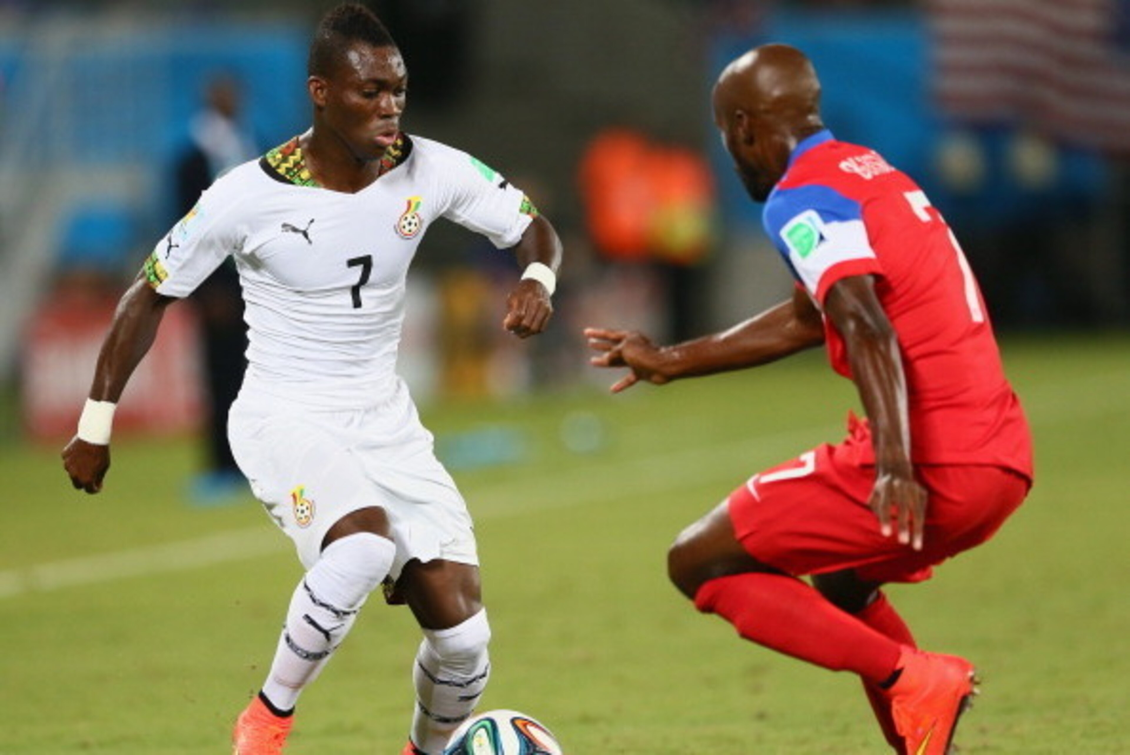NATAL, BRAZIL - JUNE 16: Christian Atsu of Ghana controls the ball against DaMarcus Beasley of the United States during the 2014 FIFA World Cup Brazil Group G match between Ghana and the United States at Estadio das Dunas on June 16, 2014 in Natal, Brazil NATAL, BRAZIL - JUNE 16: Christian Atsu of Ghana controls the ball against DaMarcus Beasley of the United States during the 2014 FIFA World Cup Brazil Group G match between Ghana and the United States at Estadio das Dunas on June 16, 2014 in Natal, Brazil