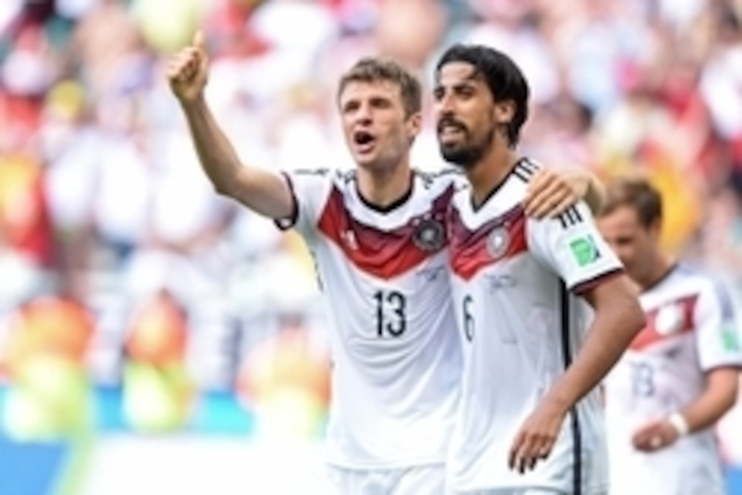 June 16, 2014; Salvador, BRAZIL; Germany players Thomas Mueller (13) and Sami Khedira celebrate a goal against Portugal during Group G play during the 2014 World Cup at Arena Fonte Nova.  Mandatory Credit: Tim Groothuis/Witters Sport via USA TODAY Sports