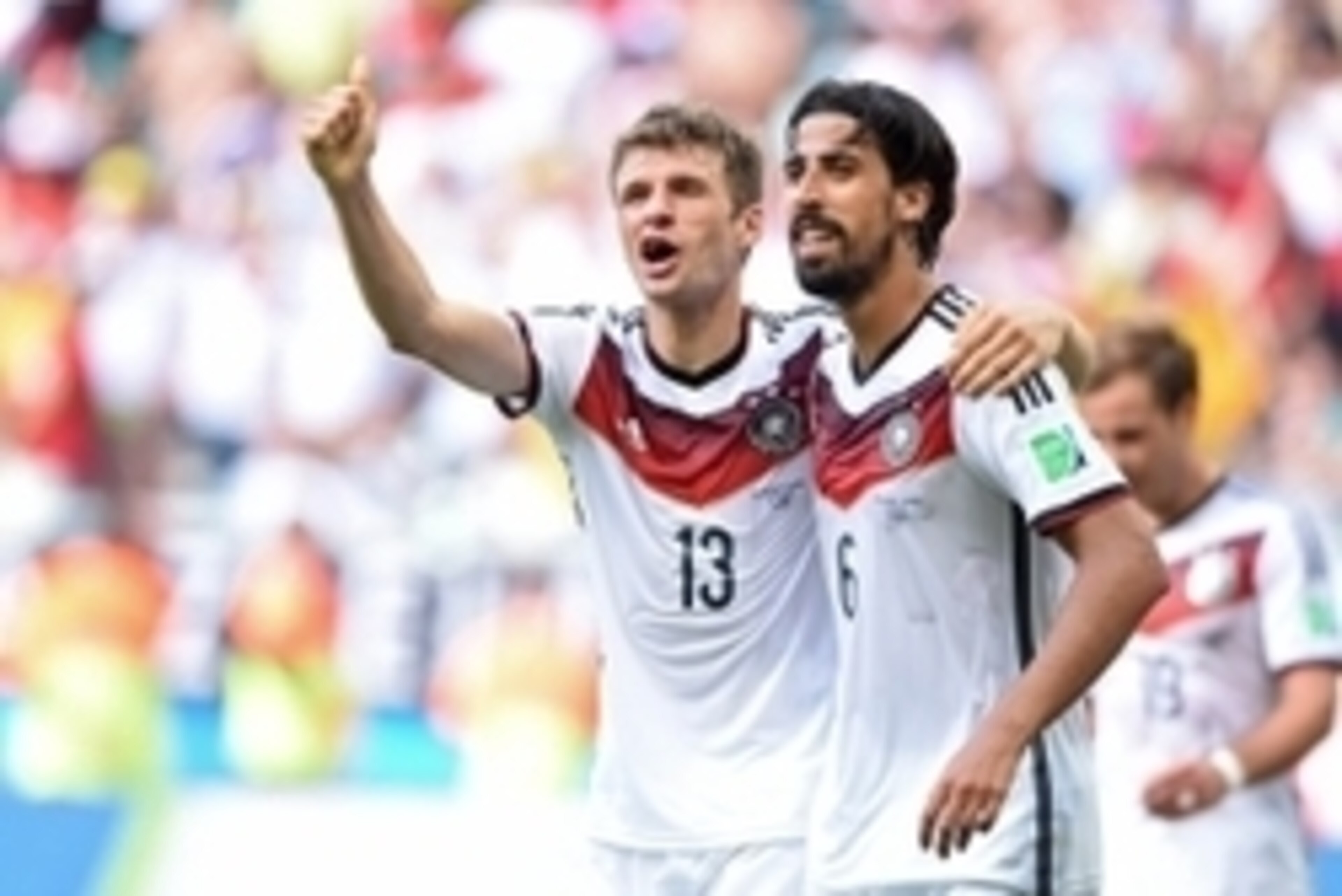 June 16, 2014; Salvador, BRAZIL; Germany players Thomas Mueller (13) and Sami Khedira celebrate a goal against Portugal during Group G play during the 2014 World Cup at Arena Fonte Nova.  Mandatory Credit: Tim Groothuis/Witters Sport via USA TODAY Sports