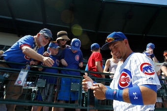MESA, AZ - MARCH 25:  Albert Almora #78 of the Chicago Cubs signs autographs before a game against the Los Angeles Angels of Anaheim at Cubs Park on March 25, 2014 in Mesa, Arizona. The Los Angeles Angels of Anaheim defeated the Chicago Cubs 8-4.  (Photo 