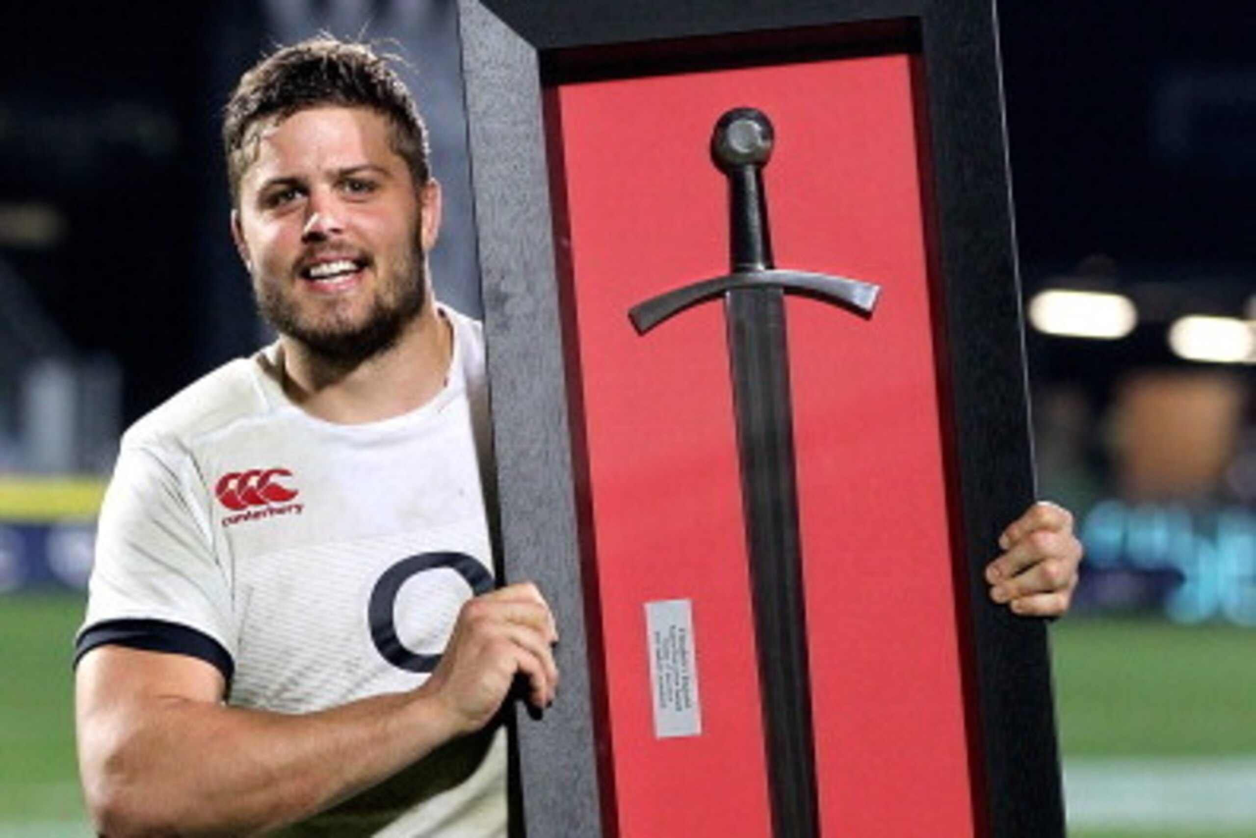 CHRISTCHURCH, NEW ZEALAND - JUNE 17:  Ed Slader, captain of England poses with a Crusaders Sword after the International Tour match between the Crusaders and England at AMI Stadium on June 17, 2014 in Christchurch, New Zealand.  (Photo by Martin Hunter/Ge
