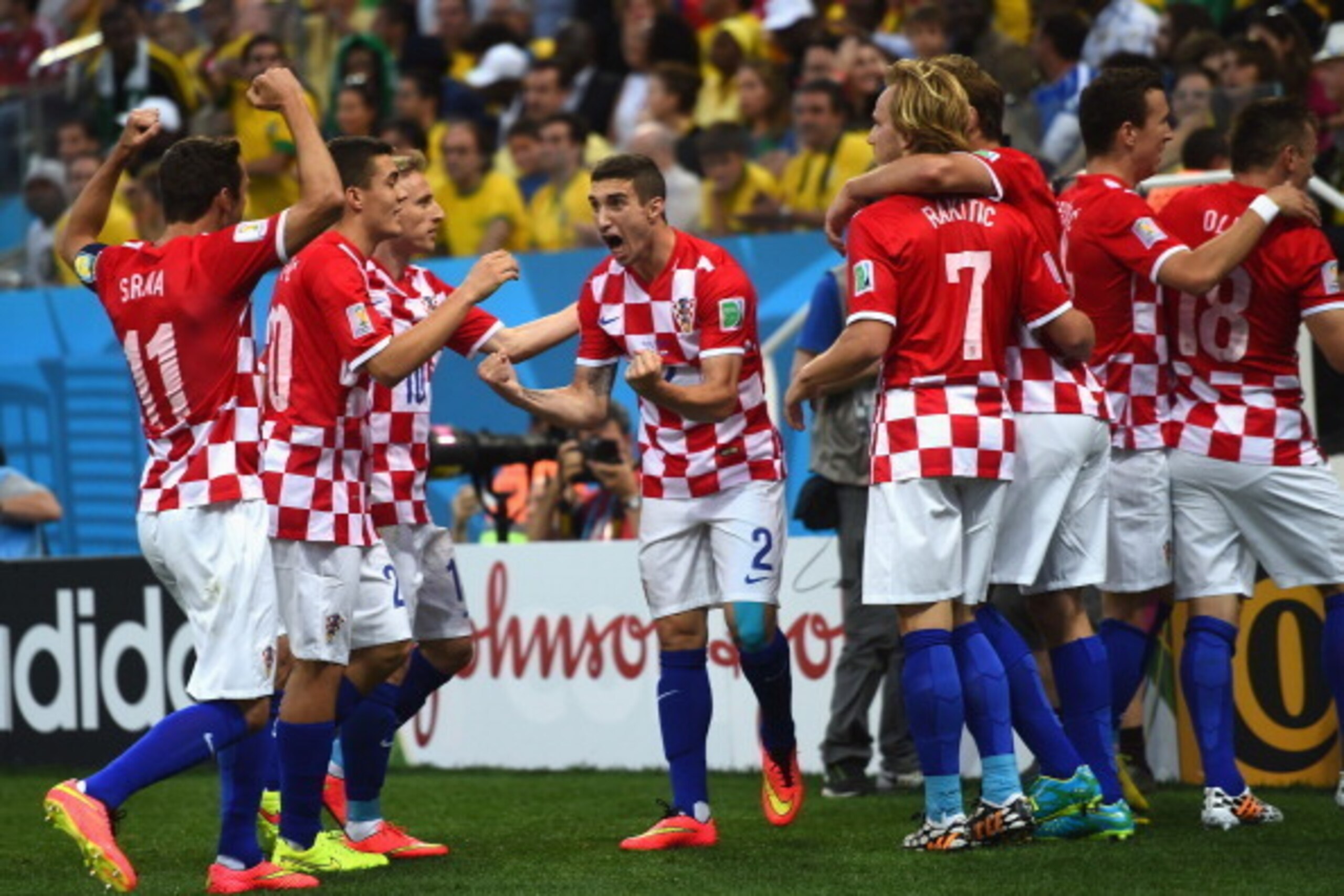 SAO PAULO, BRAZIL - JUNE 12:  Sime Vrsaljko of Croatia celebrates with teammates after a first half goal during the 2014 FIFA World Cup Brazil Group A match between Brazil and Croatia at Arena de Sao Paulo on June 12, 2014 in Sao Paulo, Brazil.  (Photo by