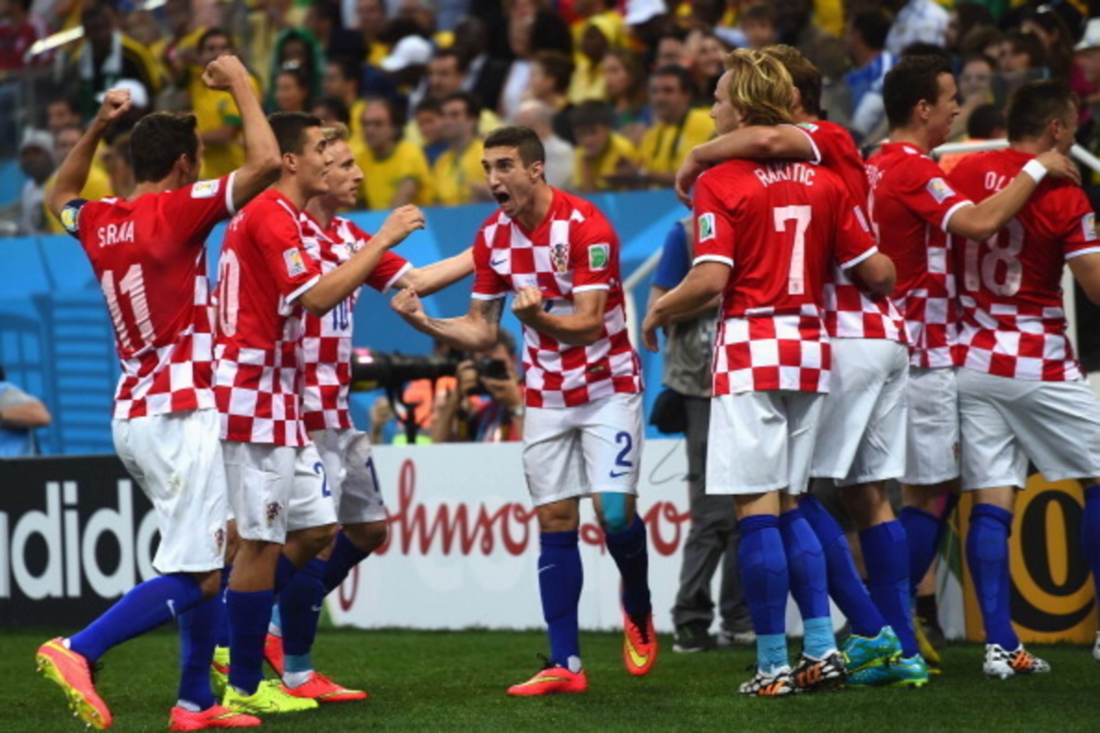 SAO PAULO, BRAZIL - JUNE 12:  Sime Vrsaljko of Croatia celebrates with teammates after a first half goal during the 2014 FIFA World Cup Brazil Group A match between Brazil and Croatia at Arena de Sao Paulo on June 12, 2014 in Sao Paulo, Brazil.  (Photo by