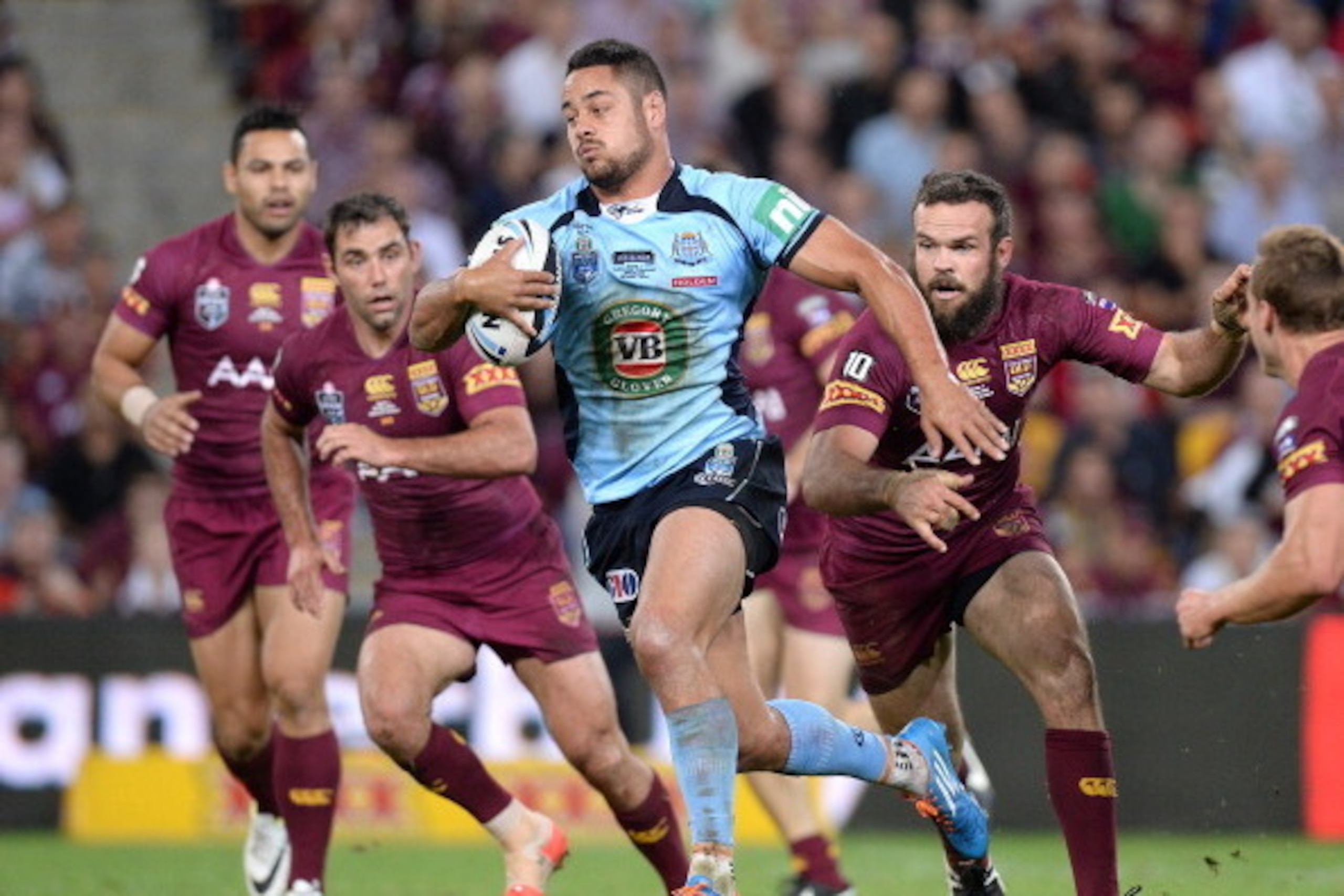BRISBANE, AUSTRALIA - MAY 28:  Jarryd Hayne of the Blues breaks through the defence during game one of the State of Origin series between the Queensland Maroons and the New South Wales Blues at Suncorp Stadium on May 28, 2014 in Brisbane, Australia.  (Pho