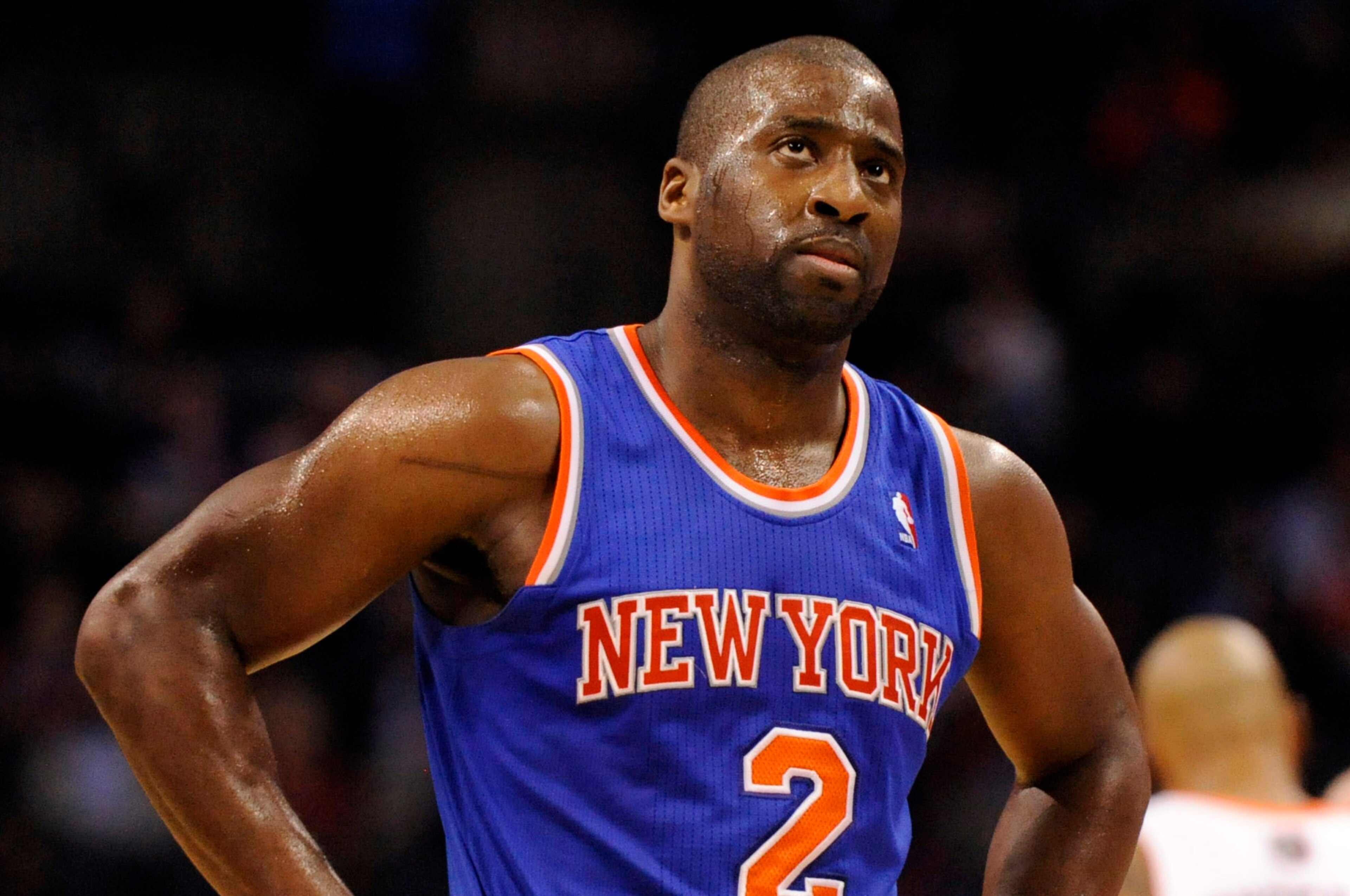 Jan 14, 2014; Charlotte, NC, USA; New York Knicks guard Raymond Felton (2) looks up at the score board after being called for his sixth foul during the second half of the game against the Charlotte Bobcats at Time Warner Cable Arena. Bobcats win 108-98. M