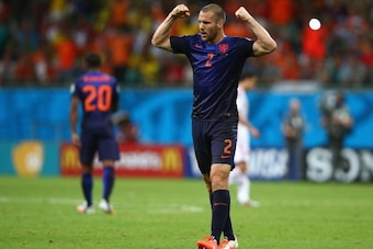 SALVADOR, BRAZIL - JUNE 13:  Ron Vlaar of the Netherlands gestures to the crowd after defeating Spain 5-1 during the 2014 FIFA World Cup Brazil Group B match between Spain and Netherlands at Arena Fonte Nova on June 13, 2014 in Salvador, Brazil.  (Photo b
