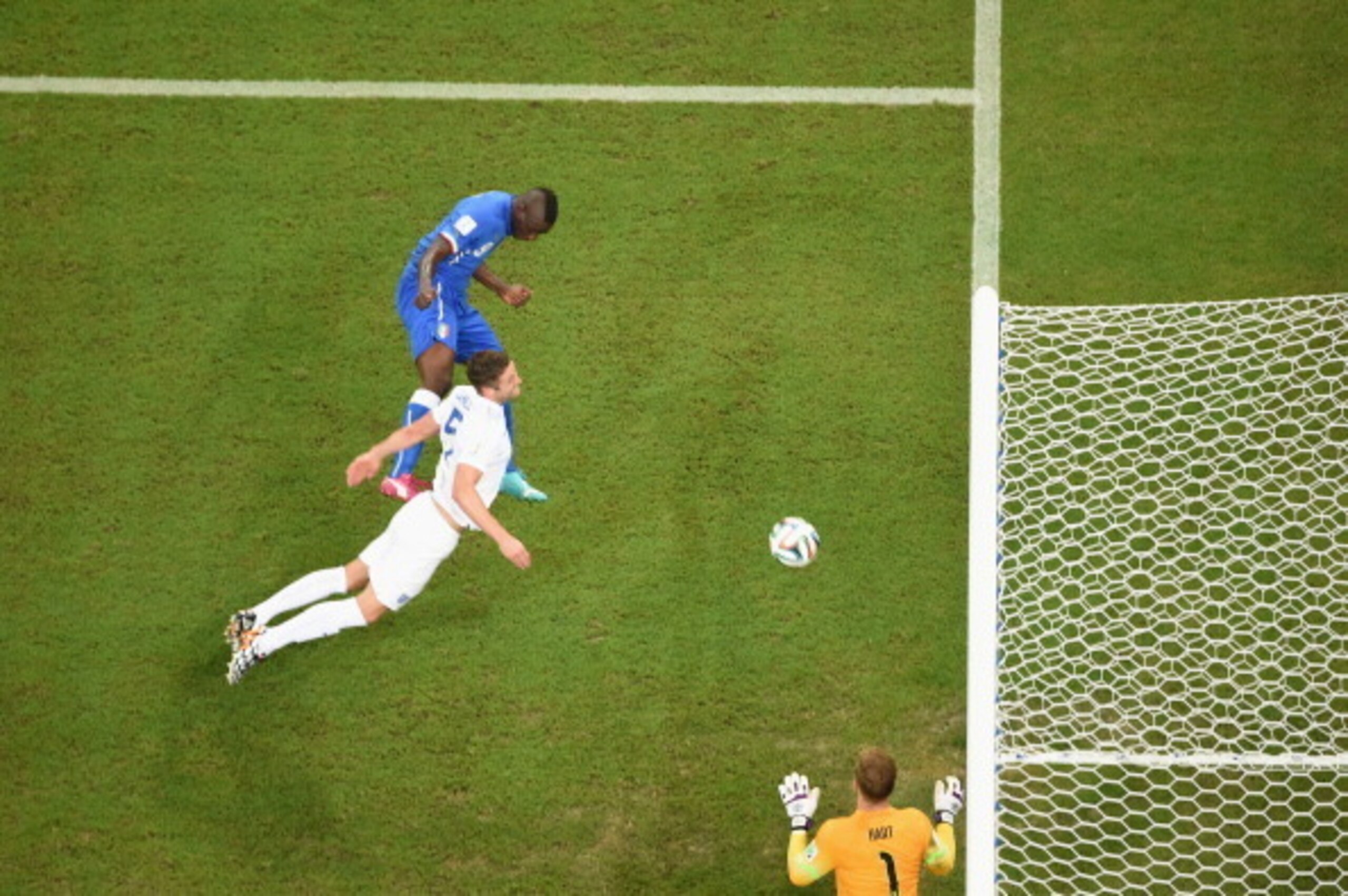 MANAUS, BRAZIL - JUNE 14:  Mario Balotelli of Italy scores their second goal during the 2014 FIFA World Cup Brazil Group D match between England and Italy at Arena Amazonia on June 14, 2014 in Manaus, Brazil.  (Photo by Pool/Getty Images)