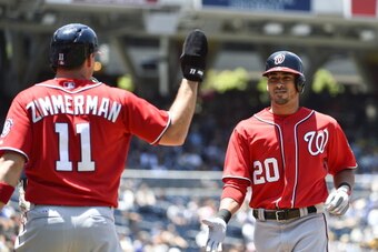 SAN DIEGO, CA - JUNE 8:  Ian Desmond #20 of the Washington Nationals, right, is congratulated by Ryan Zimmerman #11 after he hit a two-run home run during the second inning of a baseball game against the San Diego Padres at Petco Park June 8, 2014 in San 