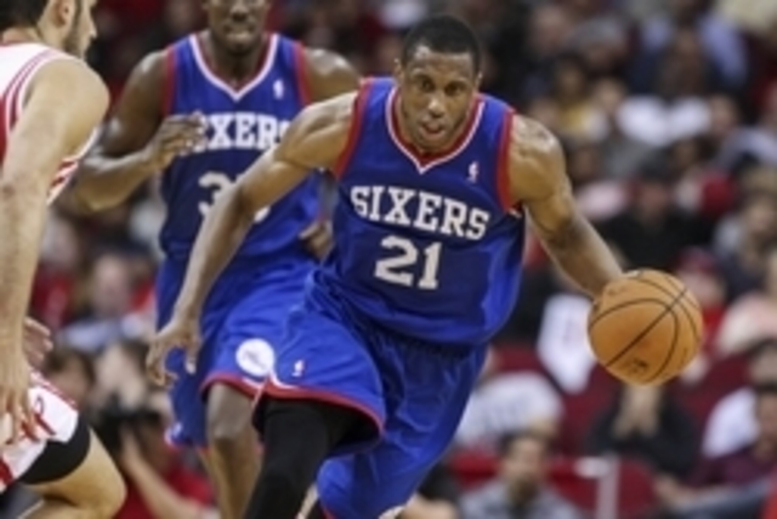 Mar 27, 2014; Houston, TX, USA; Philadelphia 76ers forward Thaddeus Young (21) drives the ball during the fourth quarter against the Houston Rockets at Toyota Center. Mandatory Credit: Troy Taormina-USA TODAY Sports