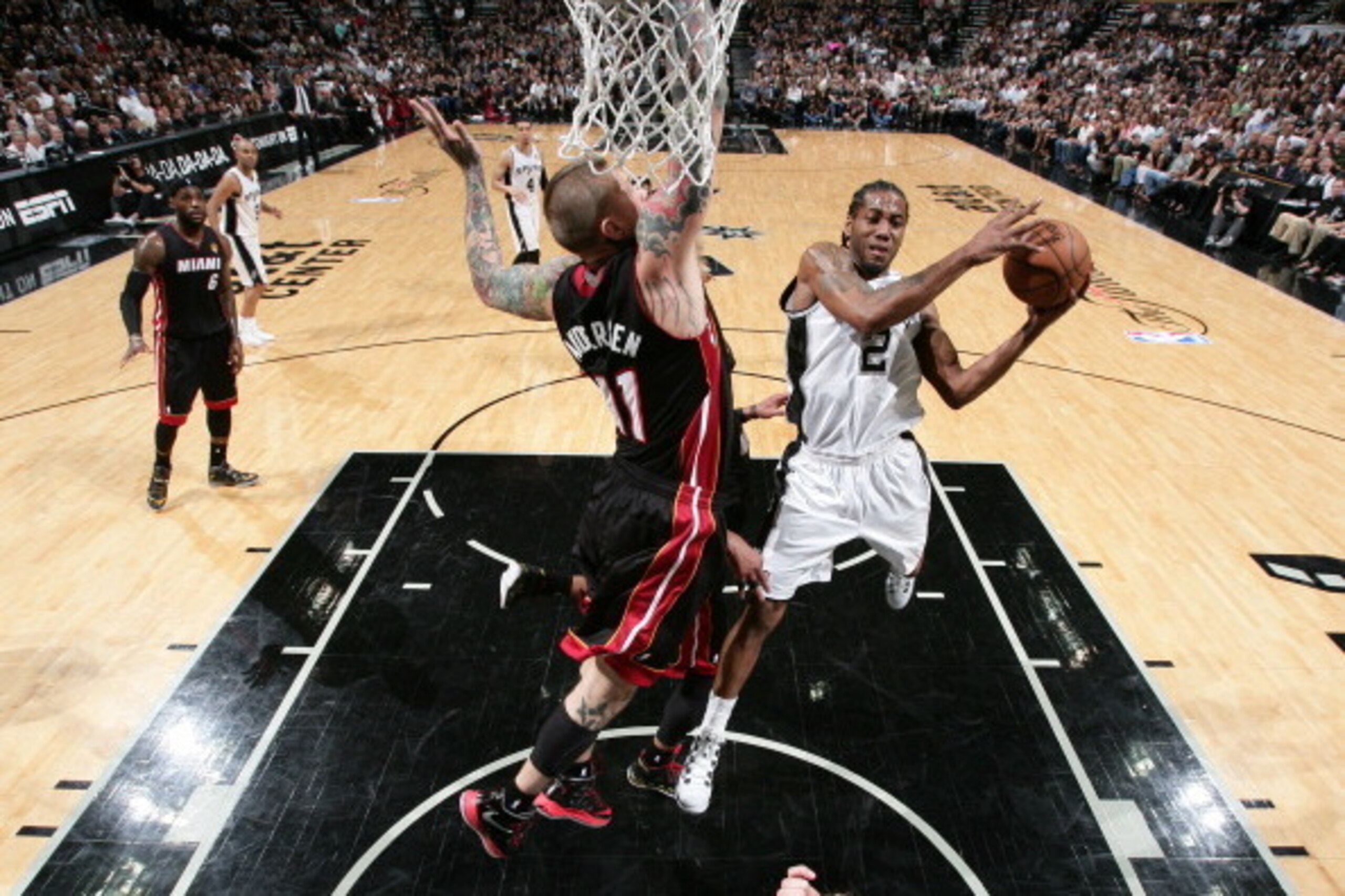 SAN ANTONIO, TX - JUNE 15: Kawhi Leonard #2 of the San Antonio Spurs shoots against Chris Andersen #11 of the Miami Heat during Game Five of the 2014 NBA Finals at AT&T Center on June 15, 2014 in San Antonio, Texas. NOTE TO USER: User expressly acknowledg