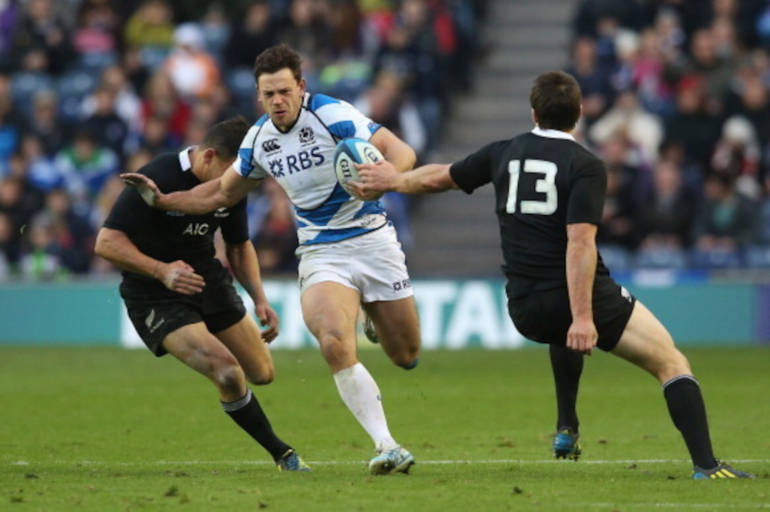 EDINBURGH, SCOTLAND - NOVEMBER 11: Nick de Luca of Scotland breaks with the ball during the international match between Scotland and the New Zealand All Blacks at Murrayfield Stadium on November 11, 2012 in Edinburgh, Scotland.  (Photo by David Rogers/Get