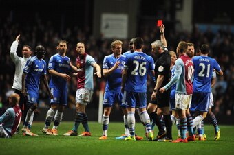 BIRMINGHAM, ENGLAND - MARCH 15:  Ramires of Chelsea (3L) is shown a red card and is sent off by referee Chris Foy after a challenge on Karim El Ahmadi of Aston Villa (L) during the Barclays Premier League match between Aston Villa and Chelsea at Villa Par