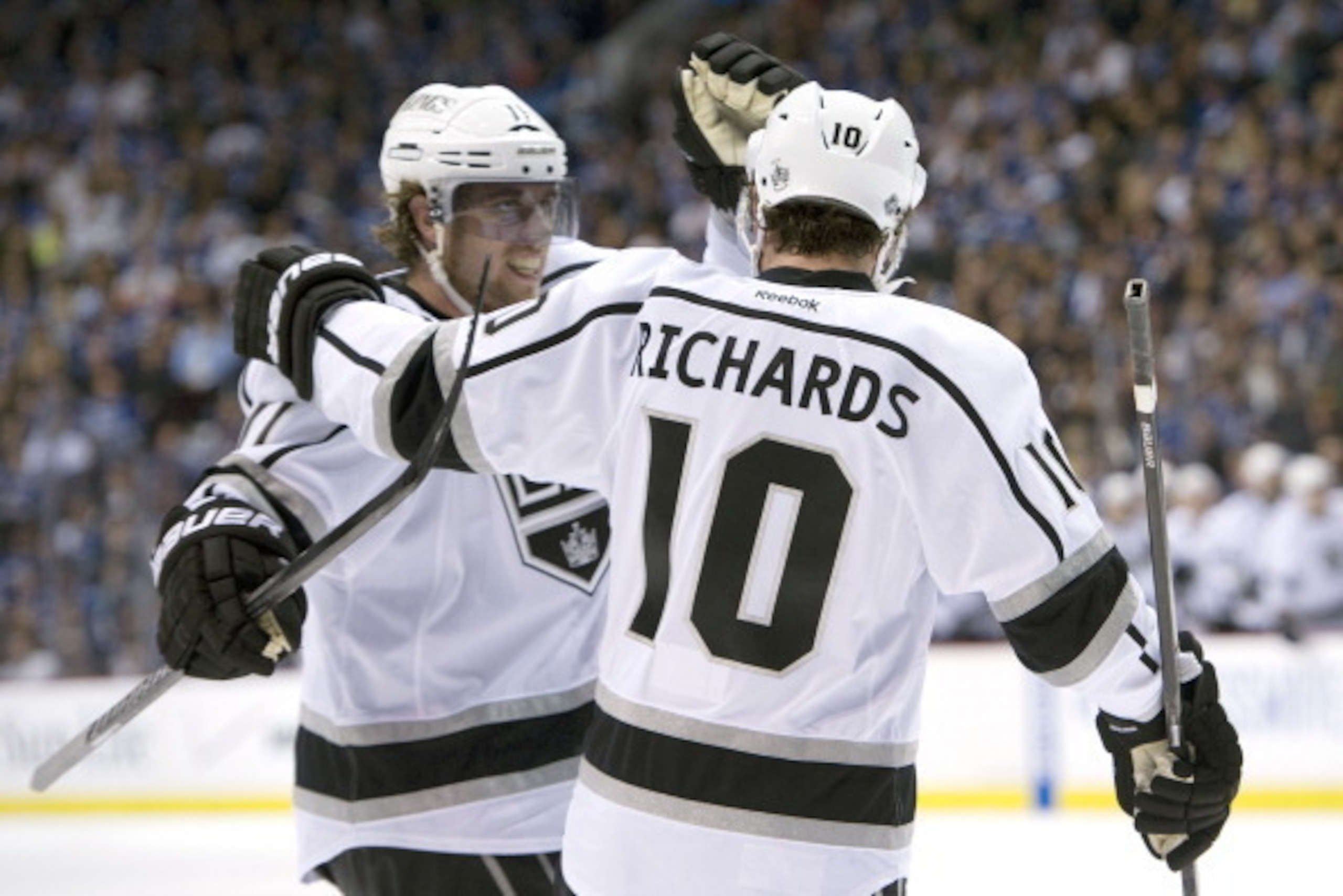 VANCOUVER, CANADA - APRIL 11: Mike Richards #10 of the Los Angeles Kings is congratulated by Anze Kopitar #11 after scoring against the Vancouver Canucks during the first period in Game One of the Western Conference Quarterfinals during the 2012 NHL Stanl