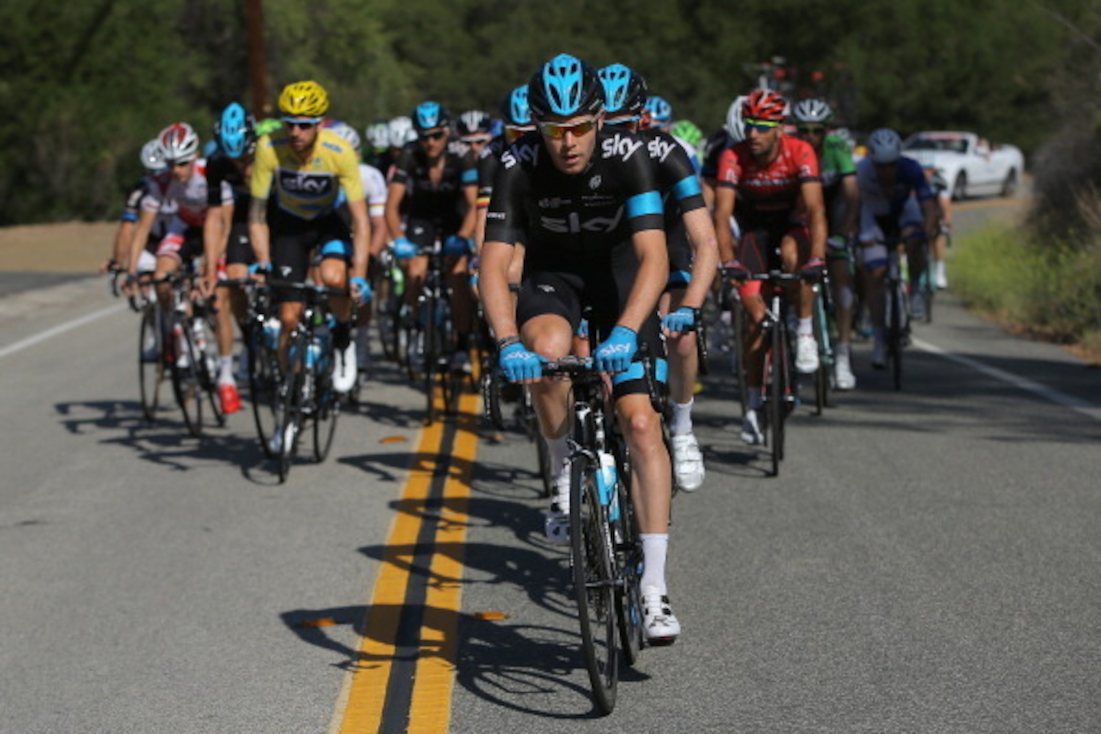 THOUSAND OAKS, CA - MAY 18:  Luke Rowe of Great Britain riding for Team Sky drives the peloton as they defend the overall race leader's yellow jersey for Sir Bradley Wiggins of Great Britain riding for Team Sky during stage eight of the 2014 Amgen Tour of
