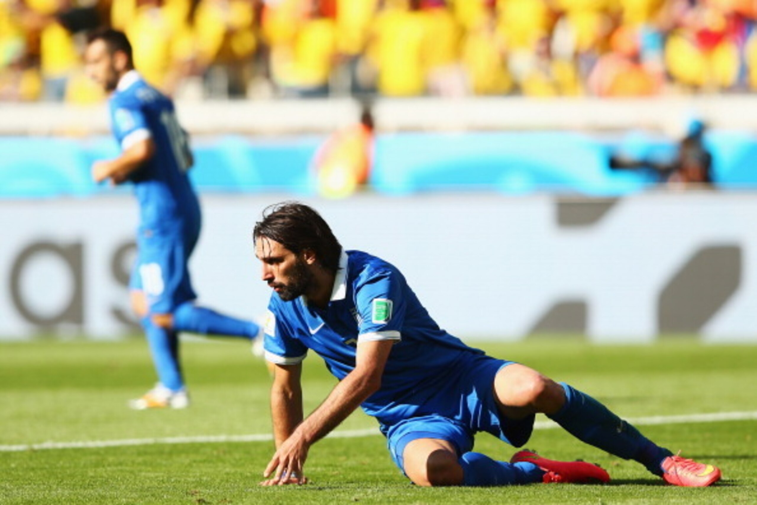 BELO HORIZONTE, BRAZIL - JUNE 14:  Giorgos Samaras of Greece falls to the ground during the 2014 FIFA World Cup Brazil Group C match between Colombia and Greece at Estadio Mineirao on June 14, 2014 in Belo Horizonte, Brazil.  (Photo by Quinn Rooney/Getty 