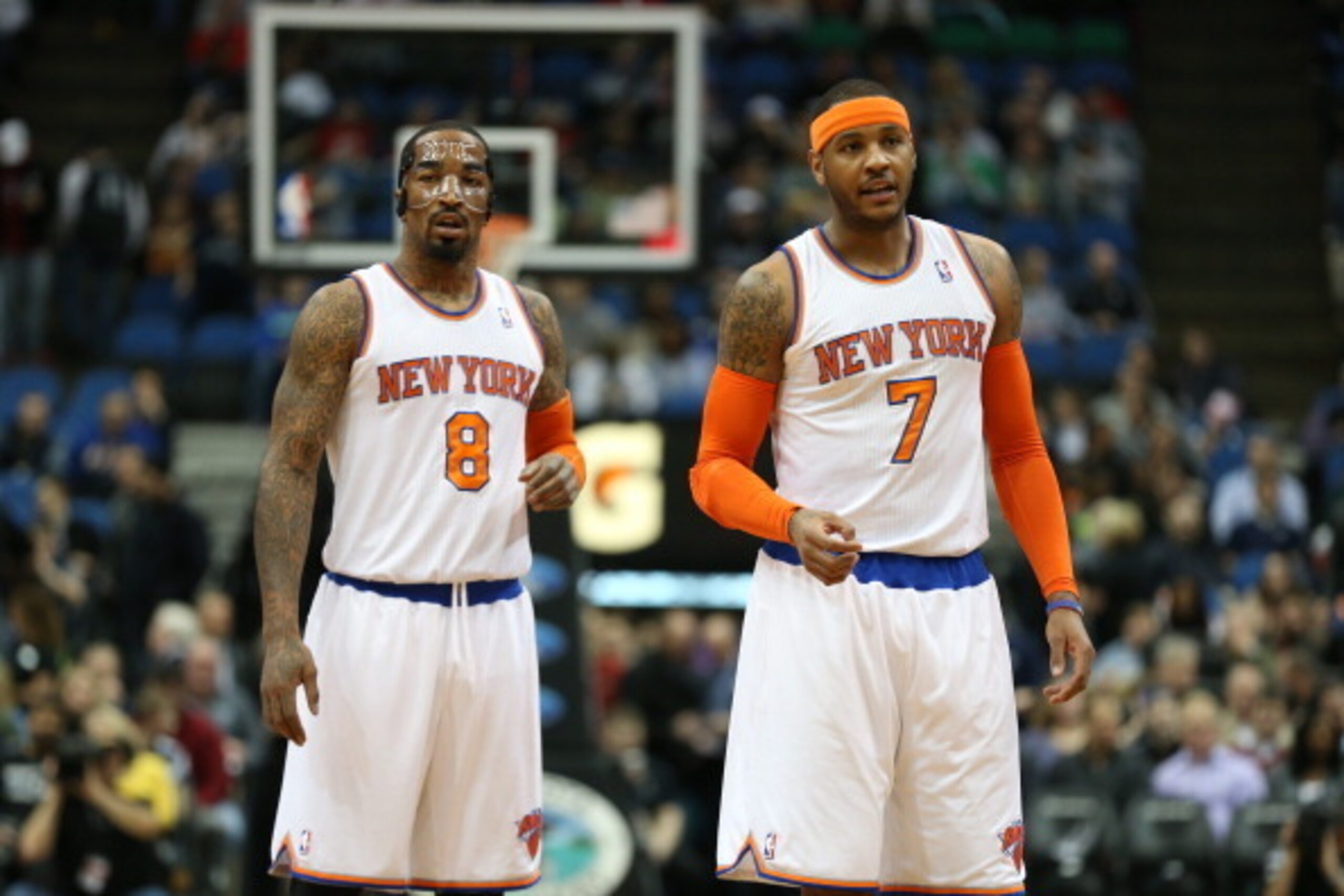 MINNEAPOLIS, MN - MARCH 5: J.R. Smith #8 and Carmelo Anthony #7 of the New York Knicks look on during the game against the Minnesota Timberwolves on March 5, 2014 at Target Center in Minneapolis, Minnesota. NOTE TO USER: User expressly acknowledges and ag