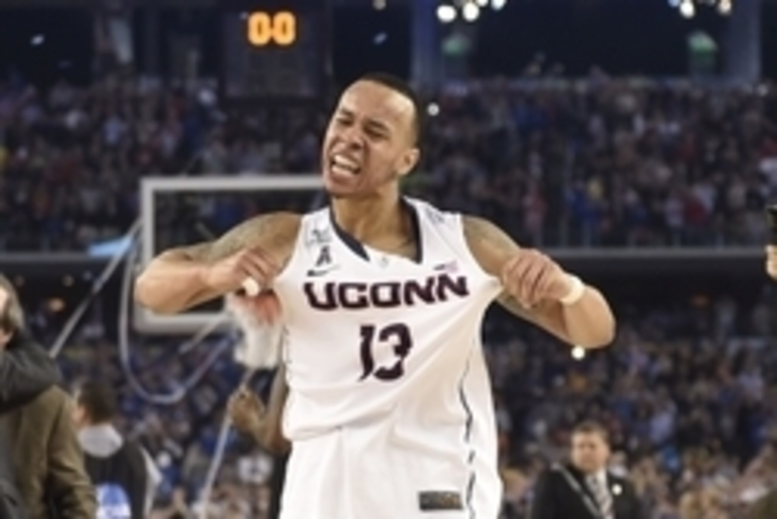 Apr 7, 2014; Arlington, TX, USA; Connecticut Huskies guard Shabazz Napier (13) celebrate after defeating the Kentucky Wildcats 60-54 in the championship game of the Final Four in the 2014 NCAA Mens Division I Championship tournament at AT&T Stadium. Manda Apr 7, 2014; Arlington, TX, USA; Connecticut Huskies guard Shabazz Napier (13) celebrate after defeating the Kentucky Wildcats 60-54 in the championship game of the Final Four in the 2014 NCAA Mens Division I Championship tournament at AT&T Stadium. Manda
