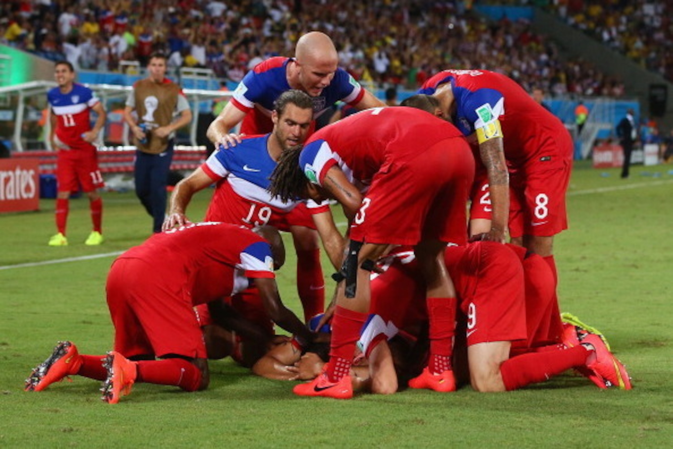 NATAL, BRAZIL - JUNE 16: John Brooks of the United States celebrates scoring his team's second goal with teammates during the 2014 FIFA World Cup Brazil Group G match between Ghana and the United States at Estadio das Dunas on June 16, 2014 in Natal, Braz