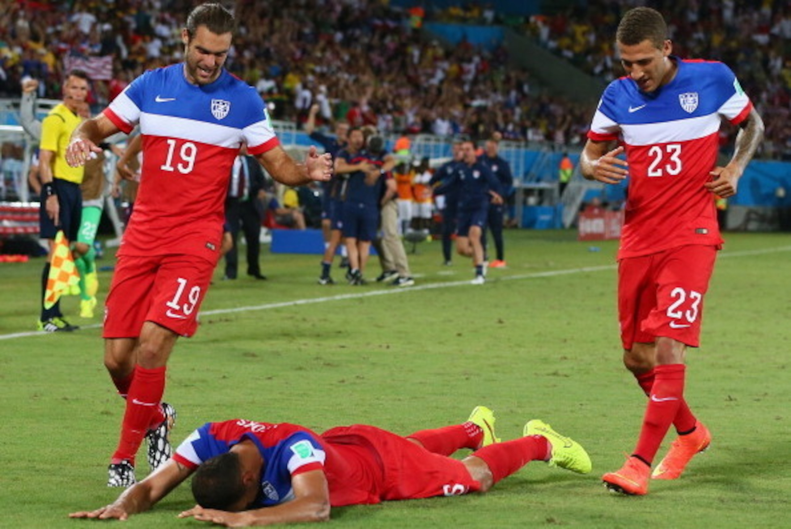 NATAL, BRAZIL - JUNE 16:  John Brooks of the United States (C) celebrates scoring his team's second goal with Graham Zusi (L) and Fabian Johnson (R) during the 2014 FIFA World Cup Brazil Group G match between Ghana and the United States at Estadio das Dun