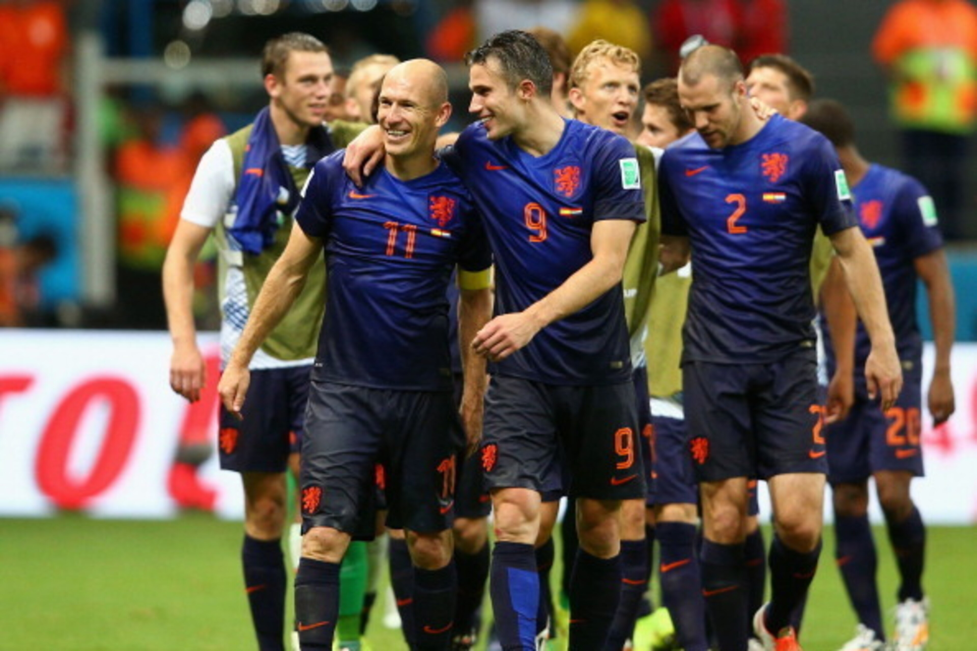 SALVADOR, BRAZIL - JUNE 13:  Arjen Robben and Robin van Persie of the Netherlands celebrate victory after the 2014 FIFA World Cup Brazil Group B match between Spain and Netherlands at Arena Fonte Nova on June 13, 2014 in Salvador, Brazil.  (Photo by Dean 