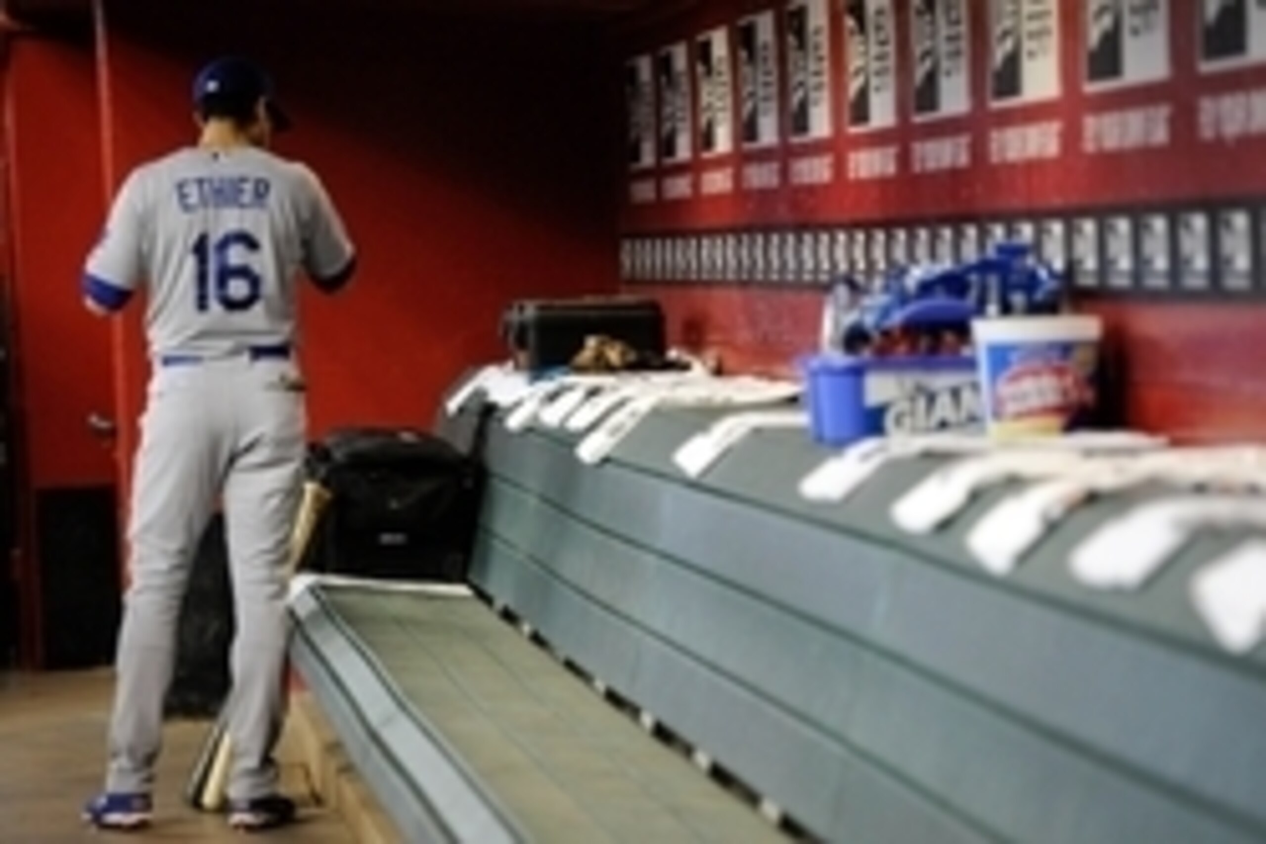 May 18, 2014; Phoenix, AZ, USA; Los Angeles Dodgers center fielder Andre Ethier (16) stands in the dugout before facing the Arizona Diamondbacks at Chase Field. The Diamondbacks won 5-3. Mandatory Credit: Joe Camporeale-USA TODAY Sports