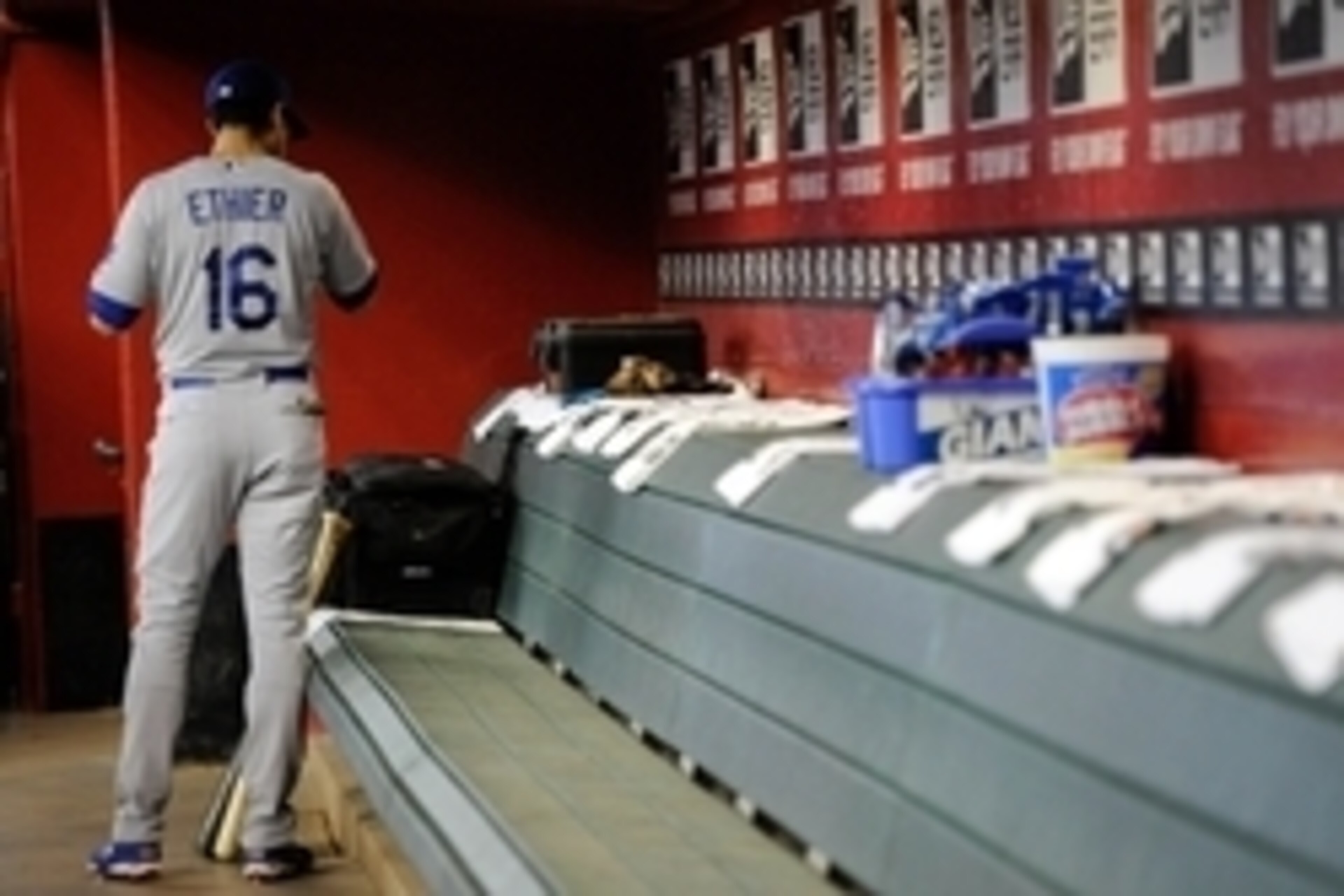 May 18, 2014; Phoenix, AZ, USA; Los Angeles Dodgers center fielder Andre Ethier (16) stands in the dugout before facing the Arizona Diamondbacks at Chase Field. The Diamondbacks won 5-3. Mandatory Credit: Joe Camporeale-USA TODAY Sports