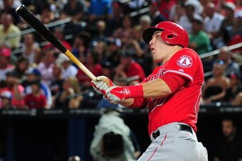 ATLANTA, GA - JUNE 15: Mike Trout #27 of the Los Angeles Angels of Anaheim hits a 3rd inning solo home run against the Atlanta Braves at Turner Field on June 15, 2014 in Atlanta, Georgia. (Photo by Scott Cunningham/Getty Images)