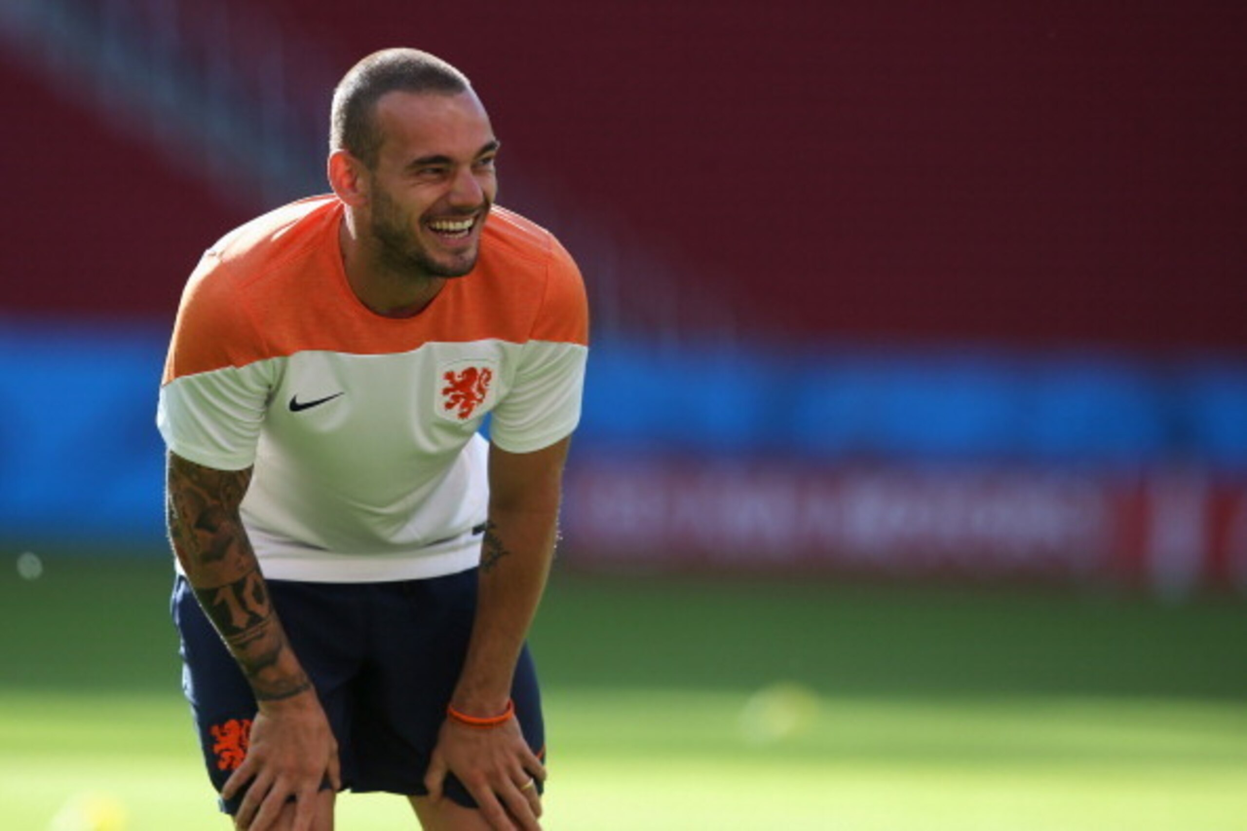 PORTO ALEGRE, BRAZIL - JUNE 17:  Wesley Sneijder has a laugh with team mate Nigel de Jong (not in fame) during the Netherlands training session at the 2014 FIFA World Cup Brazil held at the Estadio Beira-Rio on June 17, 2014 in Porto Alegre, Brazil.  (Pho