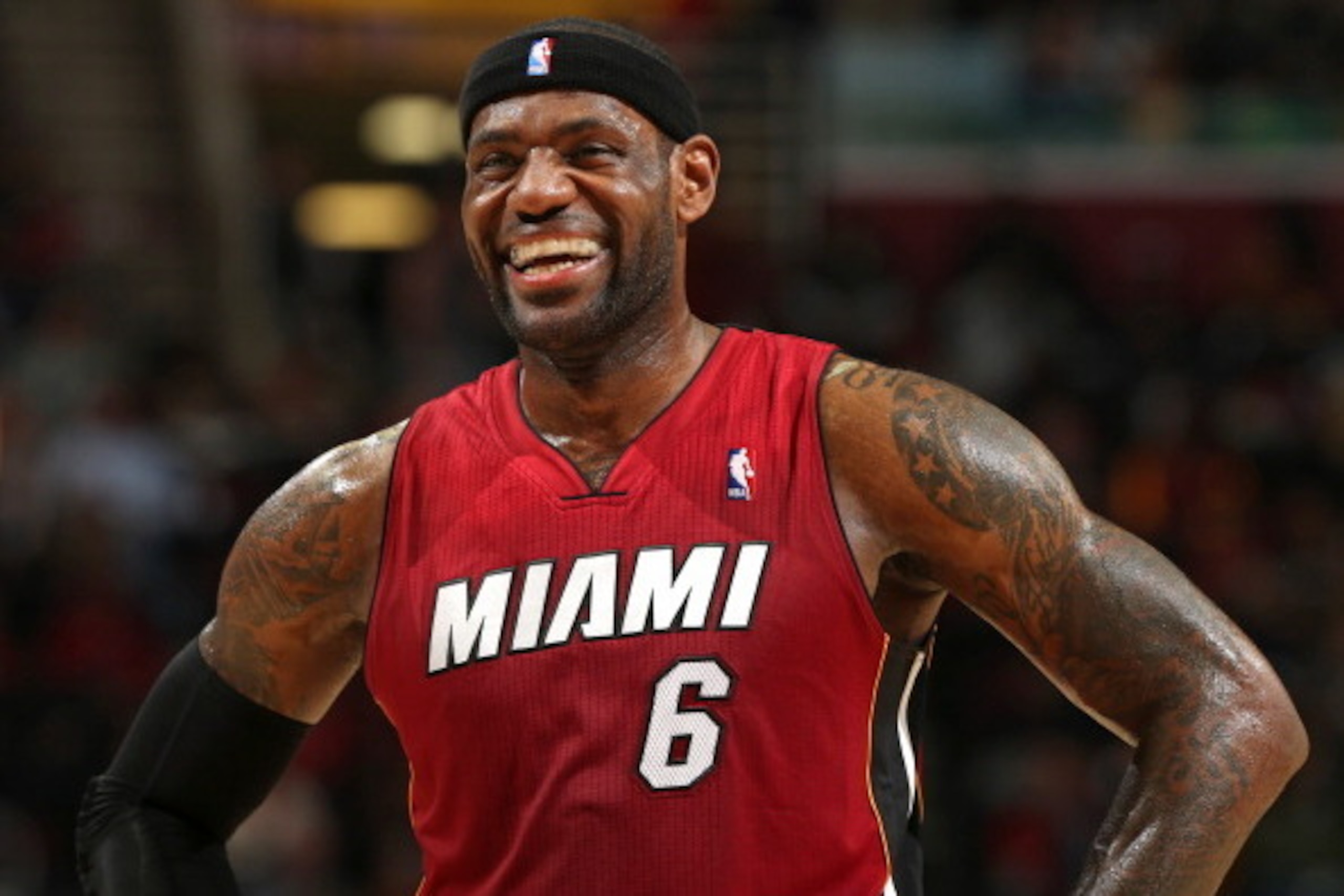 CLEVELAND, OH - MARCH 18: LeBron James #6 of the Miami Heat smiles during the game against the Cleveland Cavaliers at The Quicken Loans Arena on March 18, 2014 in Cleveland, Ohio. NOTE TO USER: User expressly acknowledges and agrees that, by downloading CLEVELAND, OH - MARCH 18: LeBron James #6 of the Miami Heat smiles during the game against the Cleveland Cavaliers at The Quicken Loans Arena on March 18, 2014 in Cleveland, Ohio. NOTE TO USER: User expressly acknowledges and agrees that, by downloading