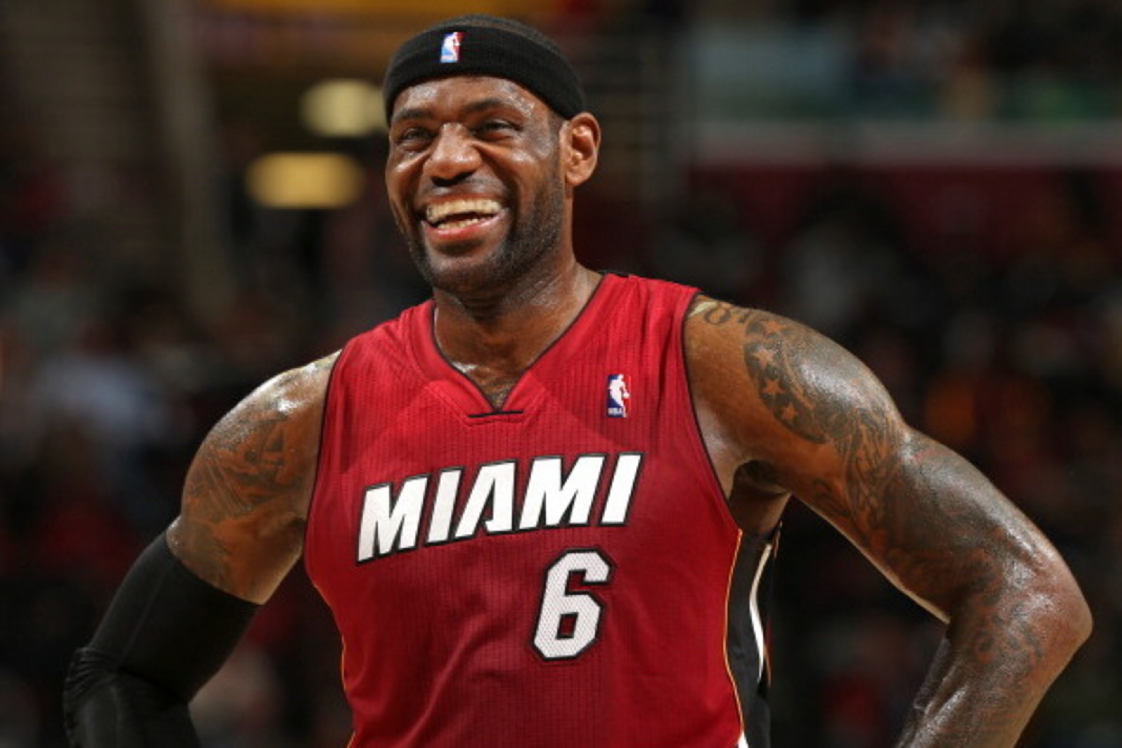CLEVELAND, OH - MARCH 18:  LeBron James #6 of the Miami Heat smiles during the game against the Cleveland Cavaliers at The Quicken Loans Arena on March 18, 2014 in Cleveland, Ohio. NOTE TO USER: User expressly acknowledges and agrees that, by downloading 