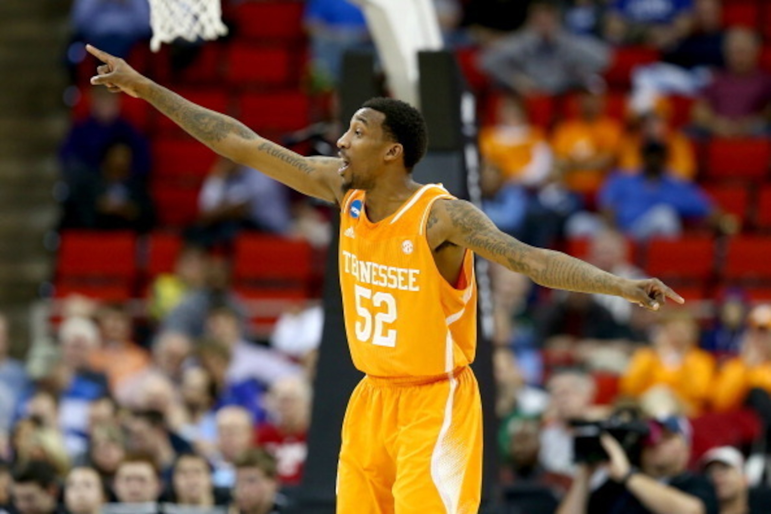 RALEIGH, NC - MARCH 21:  Jordan McRae #52 of the Tennessee Volunteers reacts in the second half while taking on the Massachusetts Minutemen in the second round of the 2014 NCAA Men's Basketball Tournament at PNC Arena on March 21, 2014 in Raleigh, North C