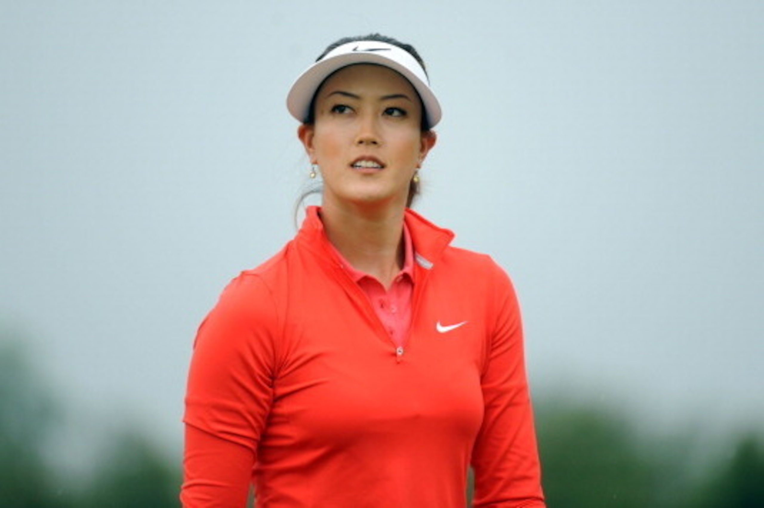 WATERLOO, ON - JUNE 8: Michelle Wie walks off the eighth green after missing her birdie putt during the final round of the Manulife Financial LPGA Classic at the Grey Silo Golf Course on June 8, 2014 in Waterloo, Ontario, Canada. (Photo by Steve Dykes/Get