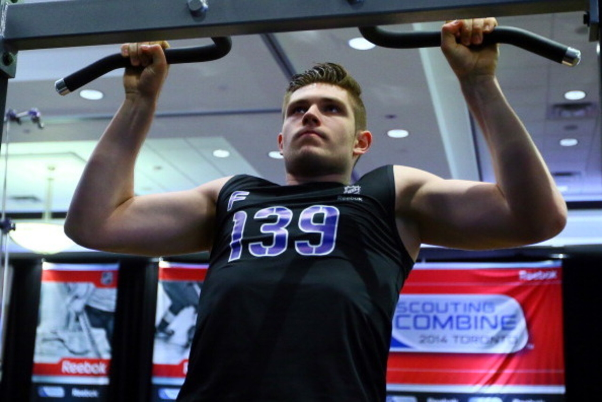 TORONTO, CANADA - MAY 31: Leon Draisaitl does a pull-up during the  the NHL Combine testing May 31, 2014 at the Westin Bristol in Toronto, Ontario, Canada. (Photo by Graig Abel/NHLI  via Getty Images)