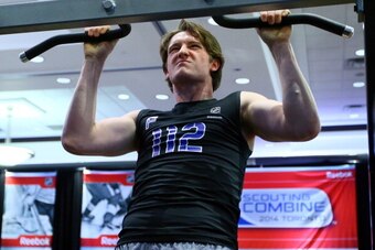 TORONTO, CANADA - MAY 31: Jared McCann does a pull-up during the  the NHL Combine testing May 31, 2014 at the Westin Bristol in Toronto, Ontario, Canada. (Photo by Graig Abel/NHLI  via Getty Images)