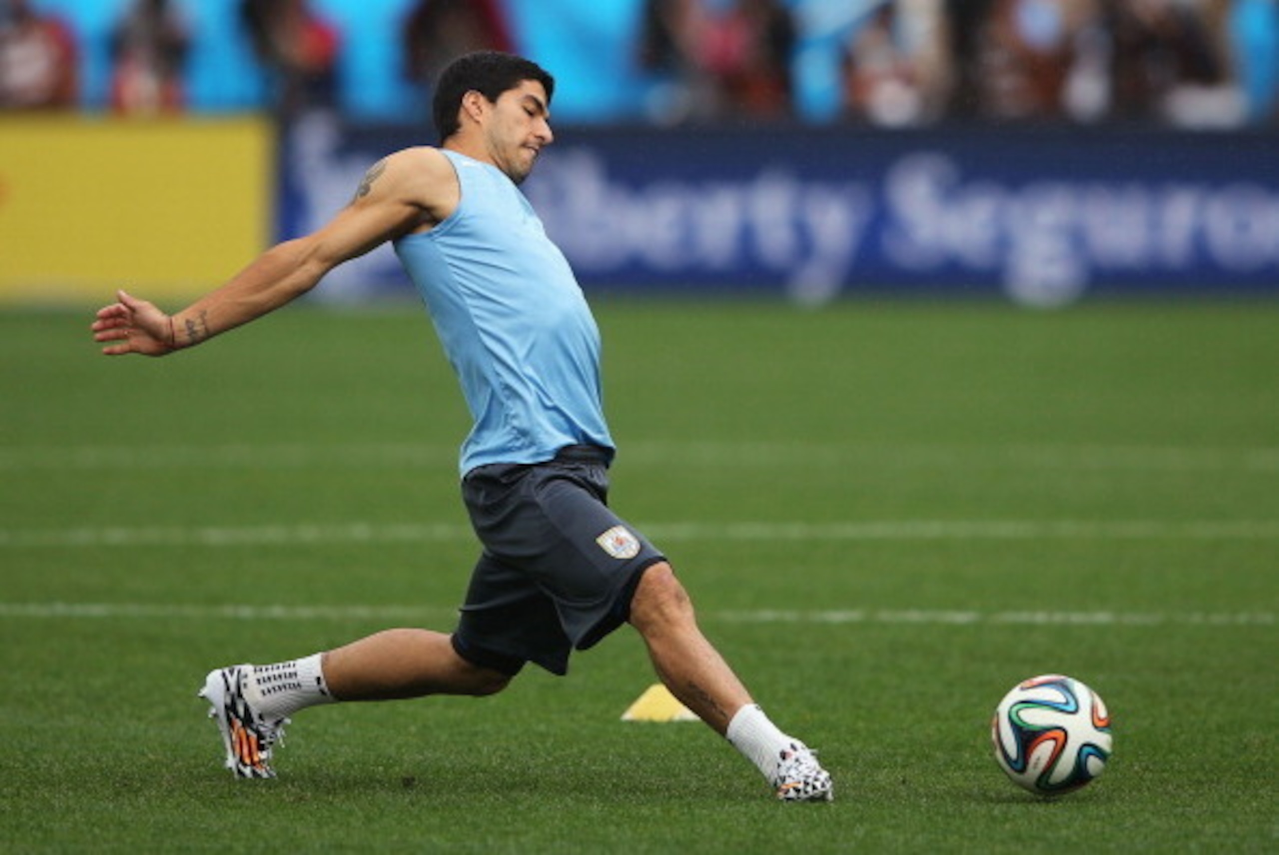 SAO PAULO, BRAZIL - JUNE 18: Luis Suarez of Uruguay in action during a Uruguay training session ahead of the 2014 FIFA World Cup Brazil match against England at Arena de Sao Paulo on June 18, 2014 in Sao Paulo, Brazil. (Photo by Richard Heathcote/Getty SAO PAULO, BRAZIL - JUNE 18: Luis Suarez of Uruguay in action during a Uruguay training session ahead of the 2014 FIFA World Cup Brazil match against England at Arena de Sao Paulo on June 18, 2014 in Sao Paulo, Brazil. (Photo by Richard Heathcote/Getty