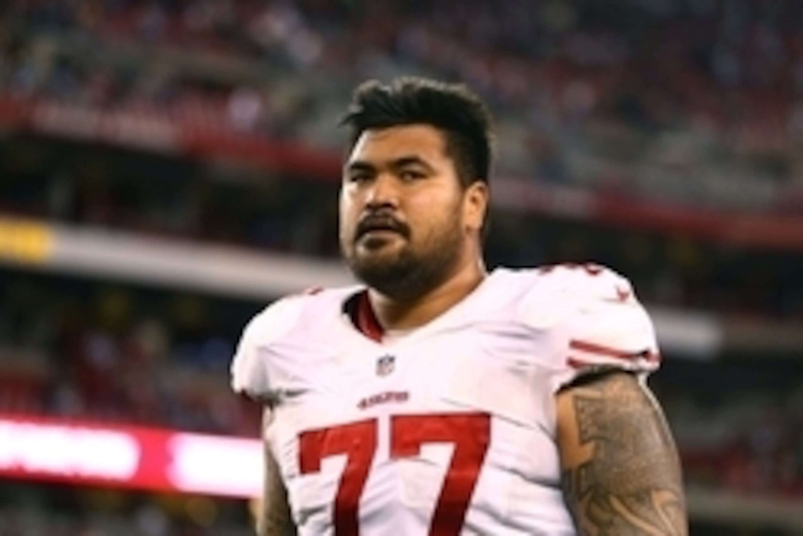 Dec 29, 2013; Phoenix, AZ, USA; San Francisco 49ers guard Mike Iupati (77) against the Arizona Cardinals at University of Phoenix Stadium. Mandatory Credit: Mark J. Rebilas-USA TODAY Sports
