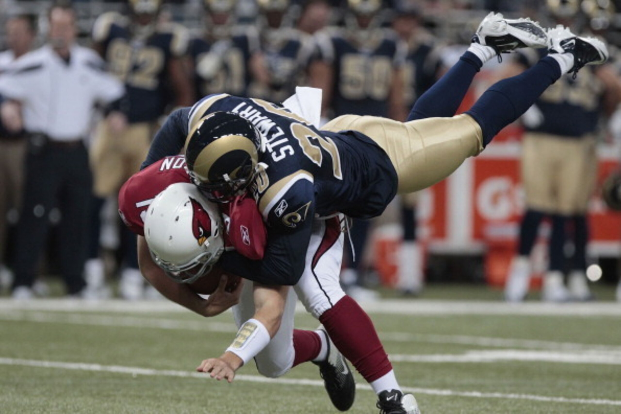 ST. LOUIS, MO - NOVEMBER 27: Quarterback John Skelton #19 of the Arizona Cardinals is sacked by strong safety Darian Stewart #20 of the St. Louis Rams in the first half of the game on November 27, 2011 at the Edward Jones Dome in St. Louis, Missouri. (P ST. LOUIS, MO - NOVEMBER 27: Quarterback John Skelton #19 of the Arizona Cardinals is sacked by strong safety Darian Stewart #20 of the St. Louis Rams in the first half of the game on November 27, 2011 at the Edward Jones Dome in St. Louis, Missouri. (P