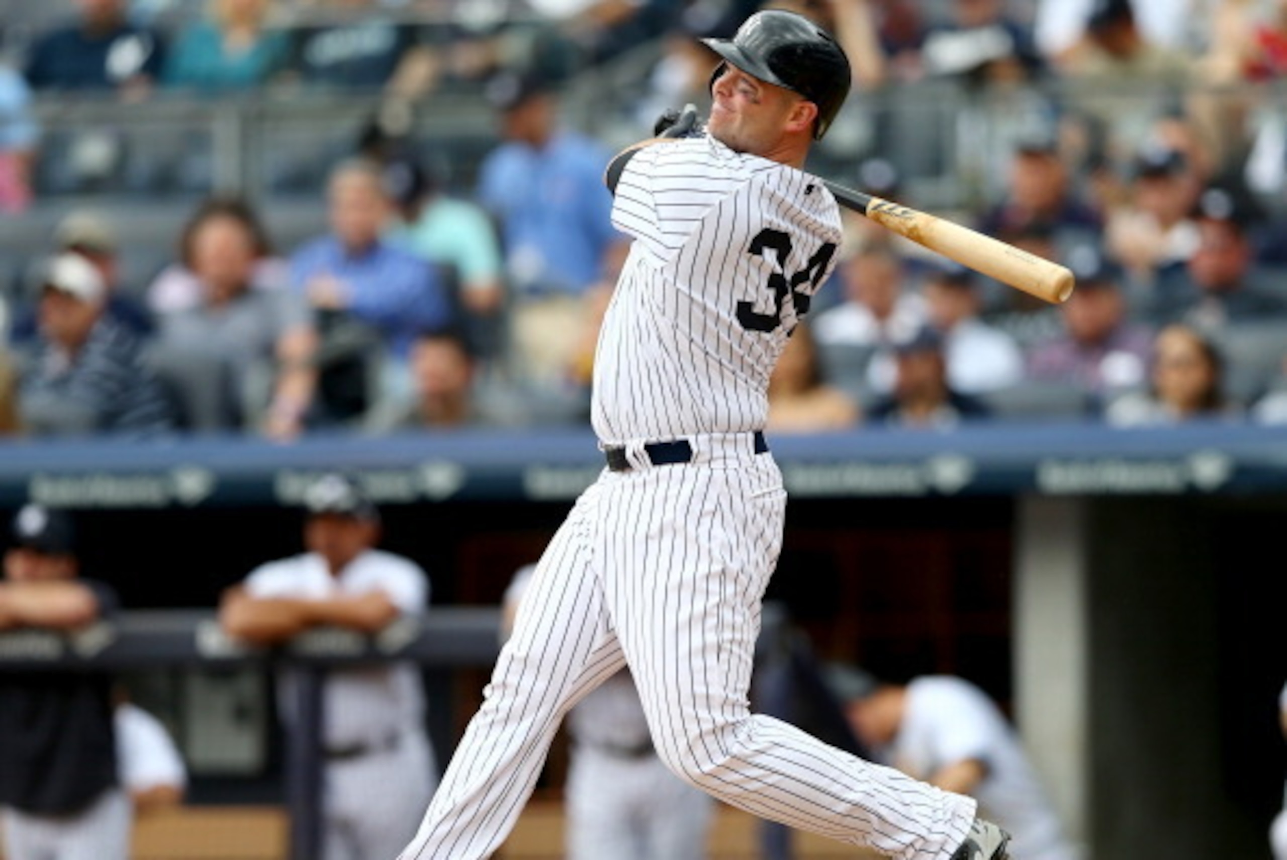 NEW YORK, NY - MAY 03:  Brian McCann #34 of the New York Yankees hits a double in the fourth inning against the Tampa Bay Rays on May 3, 2014 at Yankee Stadium in the Bronx borough of New York City.  (Photo by Elsa/Getty Images)