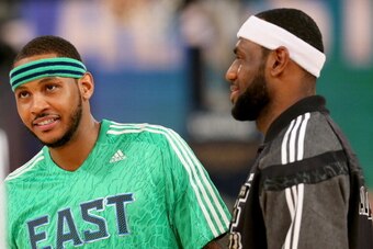 NEW ORLEANS, LA - FEBRUARY 16:  The Eastern Conference's Carmelo Anthony #7 of the New York Knicks and LeBron James #6 of the Miami Heat warm up before the game against the Western Conference during 2014 NBA All-Star game at the Smoothie King Center on Fe