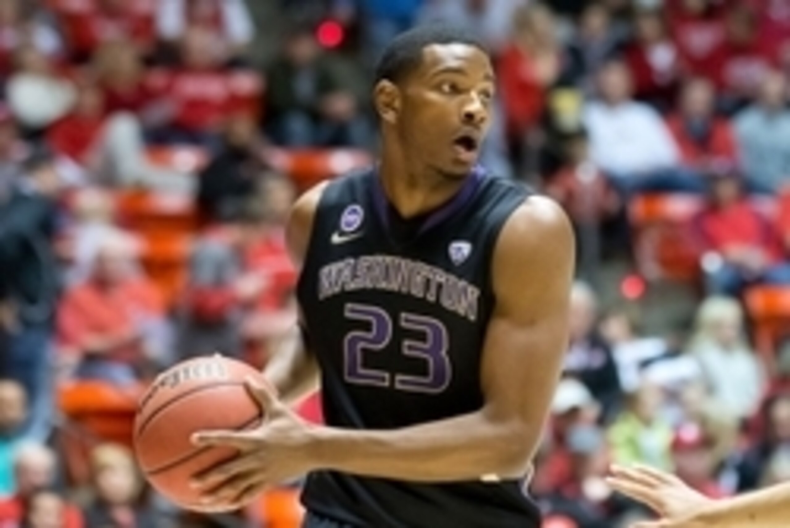 Feb 6, 2014; Salt Lake City, UT, USA; Washington Huskies guard C.J. Wilcox (23) controls the ball during the first half against the Utah Utes at Jon M. Huntsman Center. Mandatory Credit: Russ Isabella-USA TODAY Sports