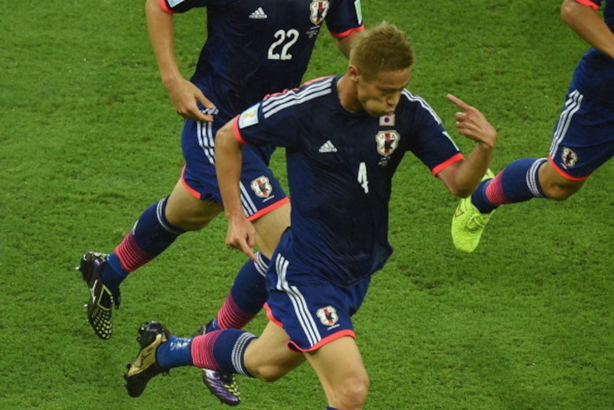 RECIFE, BRAZIL - JUNE 14: Keisuke Honda of Japan celebrates scoring his team's first goal during the 2014 FIFA World Cup Brazil Group C match between the Ivory Coast and Japan at Arena Pernambuco on June 14, 2014 in Recife, Brazil. (Photo by Matthias H RECIFE, BRAZIL - JUNE 14: Keisuke Honda of Japan celebrates scoring his team's first goal during the 2014 FIFA World Cup Brazil Group C match between the Ivory Coast and Japan at Arena Pernambuco on June 14, 2014 in Recife, Brazil. (Photo by Matthias H