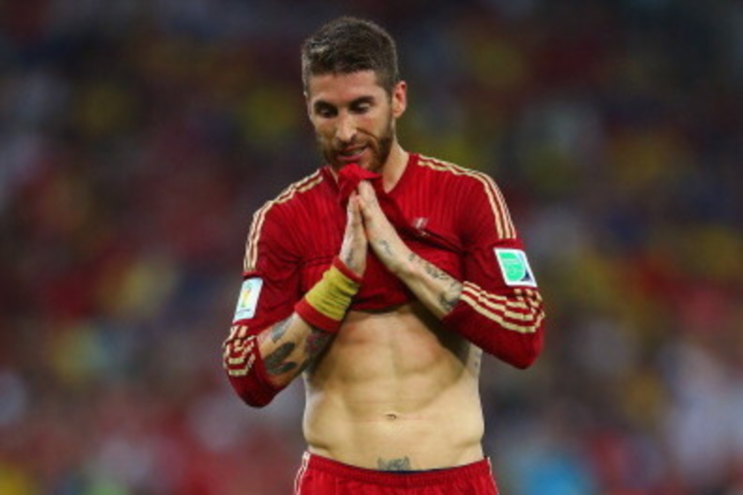 RIO DE JANEIRO, BRAZIL - JUNE 18:  Sergio Ramos of Spain reacts during the 2014 FIFA World Cup Brazil Group B match between Spain and Chile at Maracana on June 18, 2014 in Rio de Janeiro, Brazil.  (Photo by Jamie Squire/Getty Images)