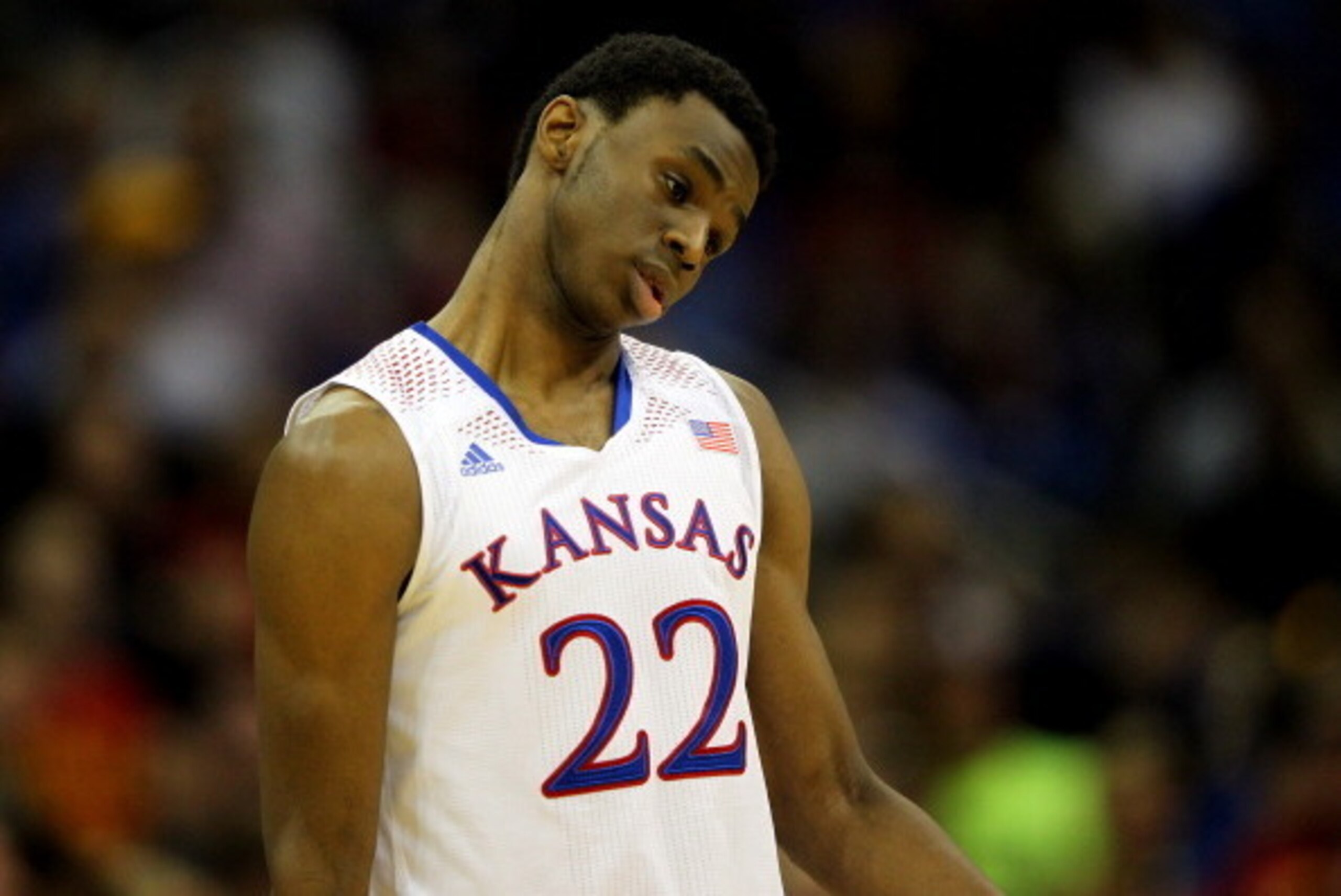 KANSAS CITY, MO - MARCH 14:  Andrew Wiggins #22 of the Kansas Jayhawks walks off the court after the Jayhawks were deated by the Iowa State Cyclones in the Big 12 Basketball Tournament semifinal game at Sprint Center on March 14, 2014 in Kansas City, Miss
