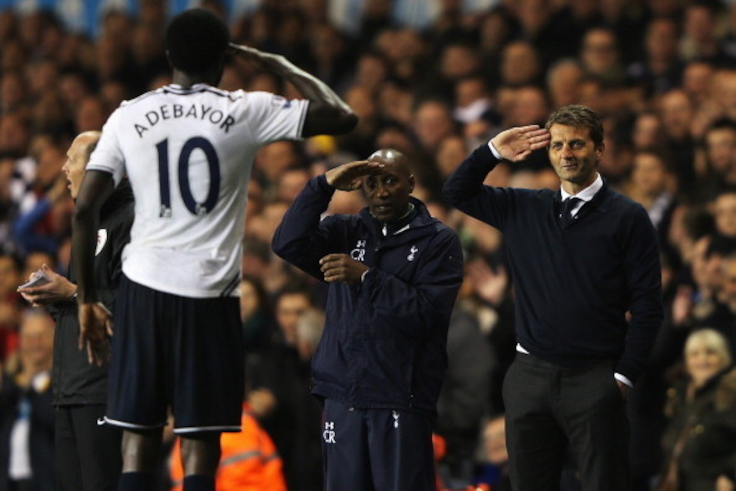 LONDON, ENGLAND - APRIL 07:  Emmanuel Adebayor of Tottenham Hotspur celebrates scoring his second goal with Tim Sherwood (R), manager of Tottenham Hotspur and Chris Ramsey during the Barclays Premier League match between Tottenham Hotspur and Sunderland a