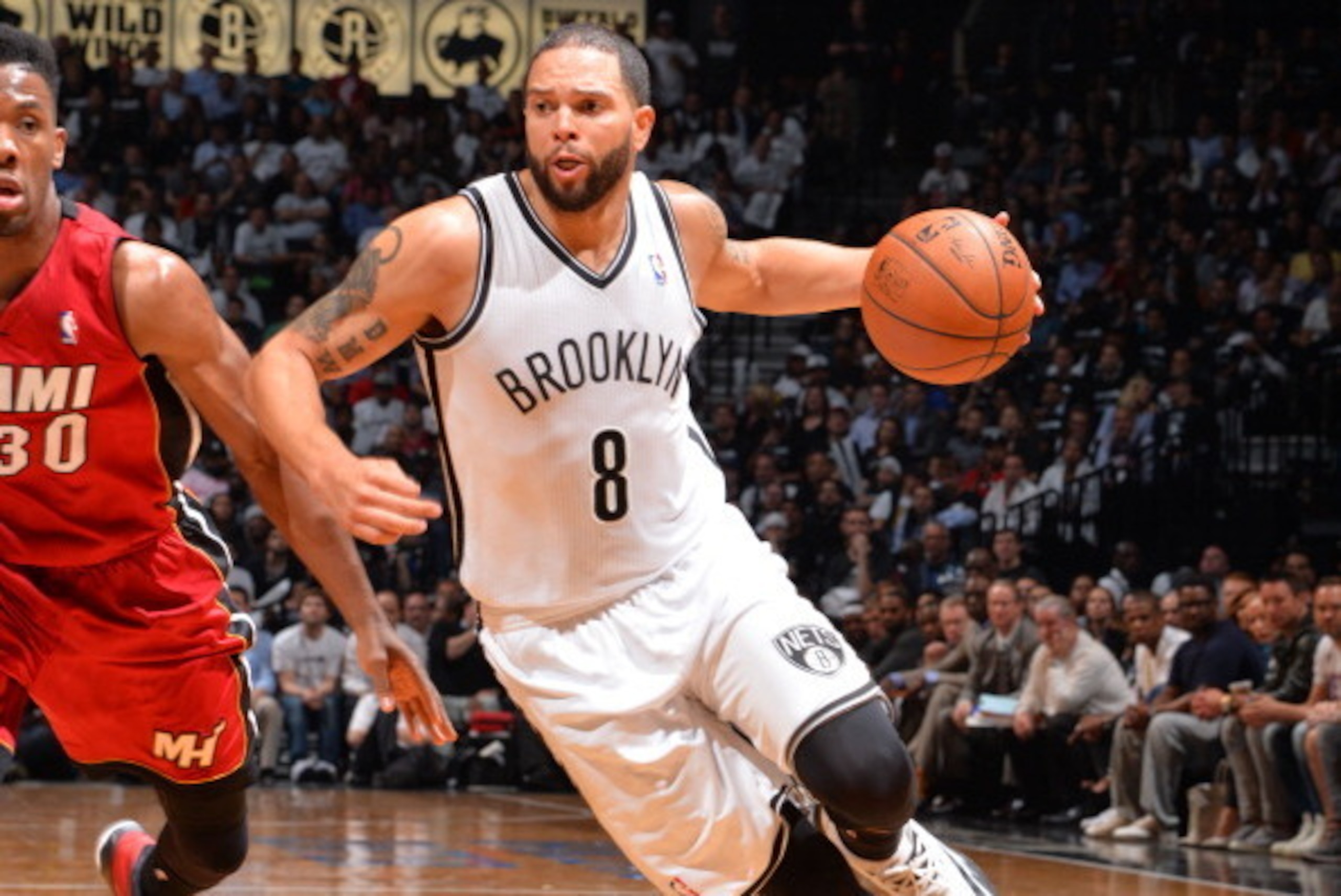 BROOKLYN, NY - MAY 12: Deron Williams #8 of the Brooklyn Nets handles the ball against the Miami Heat in Game Four of the Eastern Conference Semifinals on May 12, 2014 at Barclays Center in Brooklyn. NOTE TO USER: User expressly acknowledges and agrees th BROOKLYN, NY - MAY 12: Deron Williams #8 of the Brooklyn Nets handles the ball against the Miami Heat in Game Four of the Eastern Conference Semifinals on May 12, 2014 at Barclays Center in Brooklyn. NOTE TO USER: User expressly acknowledges and agrees th